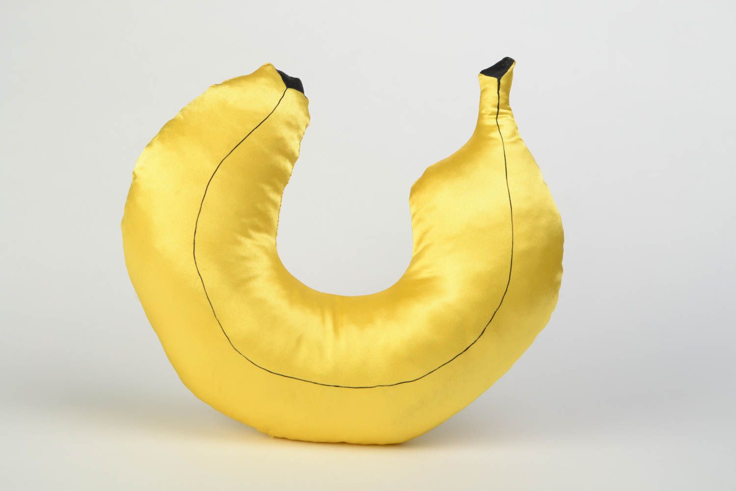 Handmade yellow satin travel pillow in the shape of banana photo 4