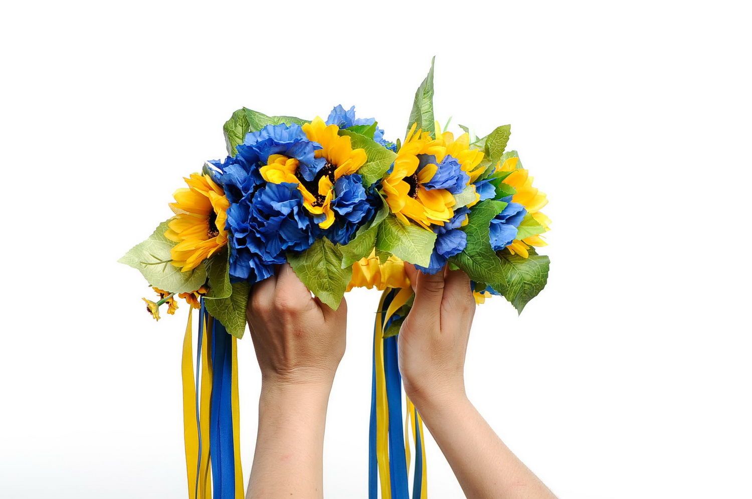 Wreath with artificial flowers and thin ribbons photo 4
