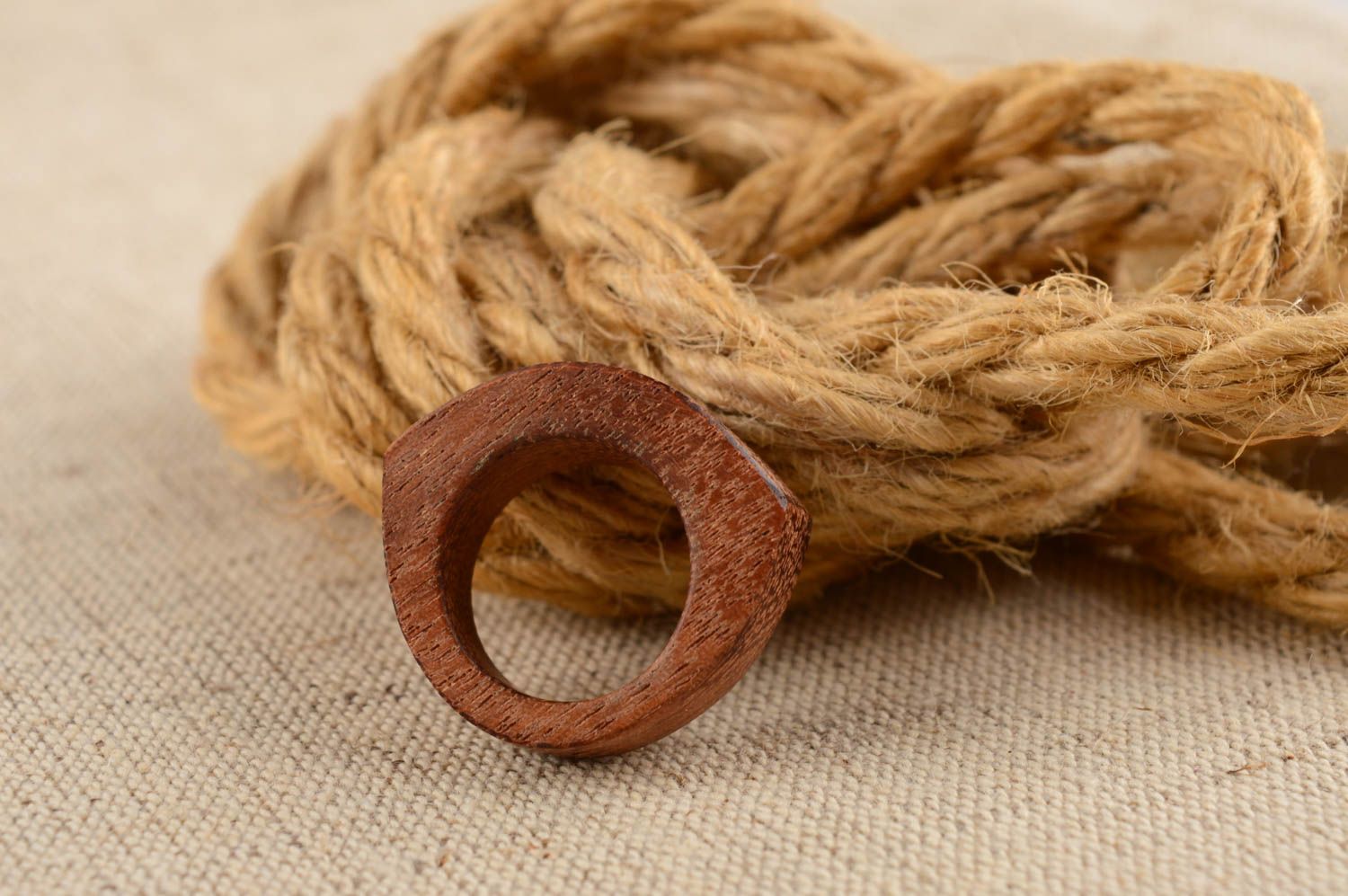 Handmade stylish female brown round ring made of wood of unusual shape photo 1