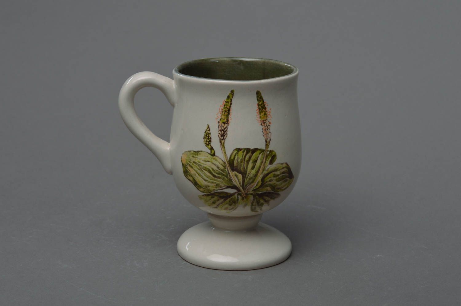 Art ceramic clay glazed cup in white color with handle and floral pattern photo 1