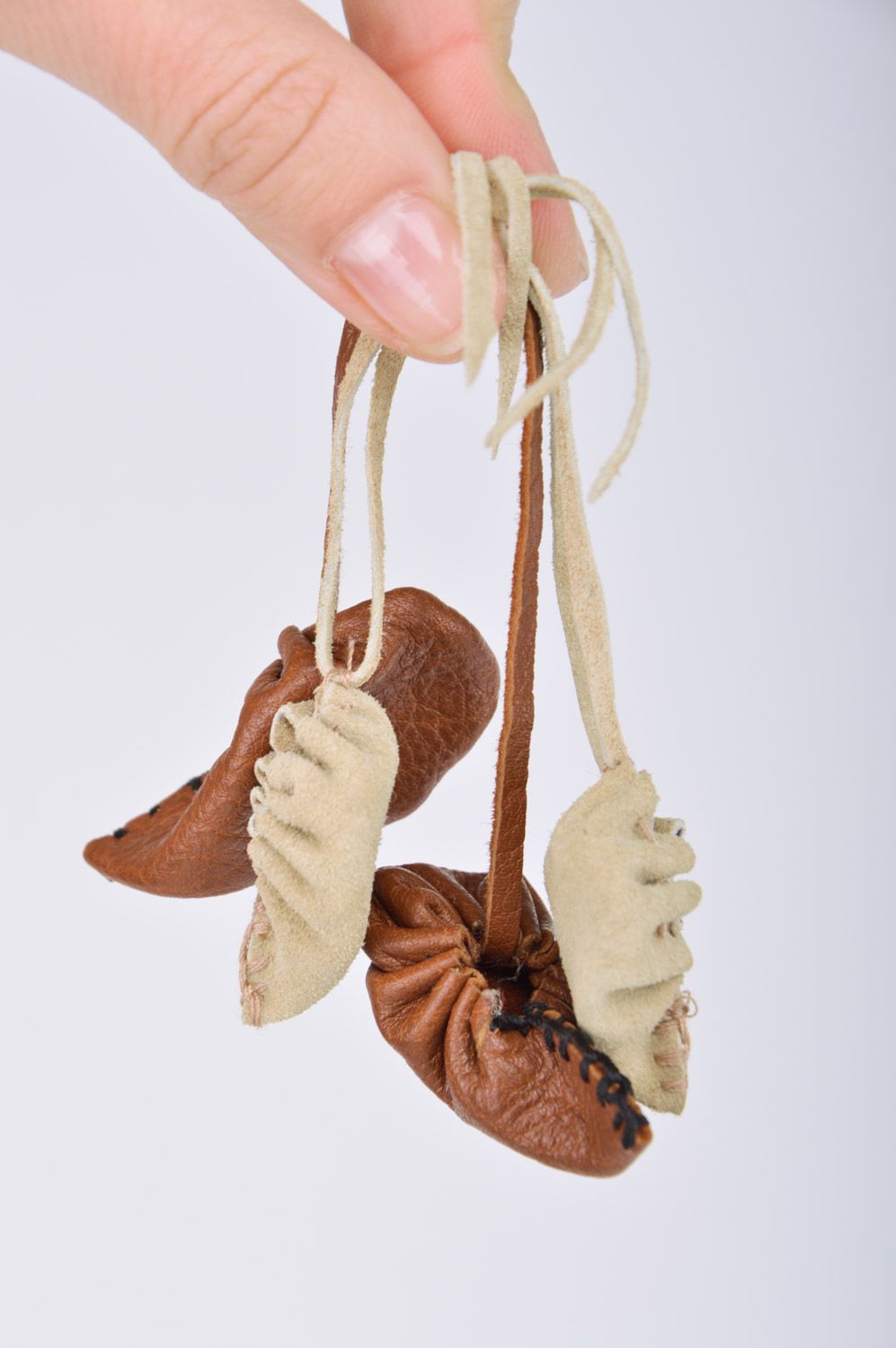 Set of handmade leather keychains 2 items brown key accessories in the shape of bast shoes photo 3