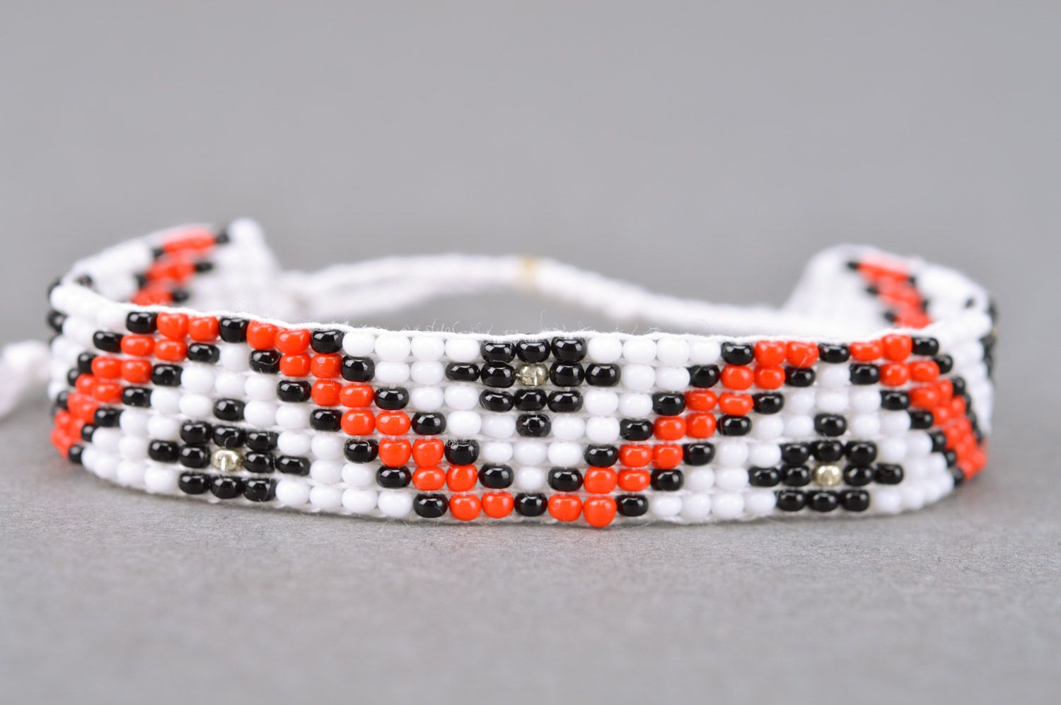 Handmade wide beaded bracelet with beautiful patterns and ties photo 5