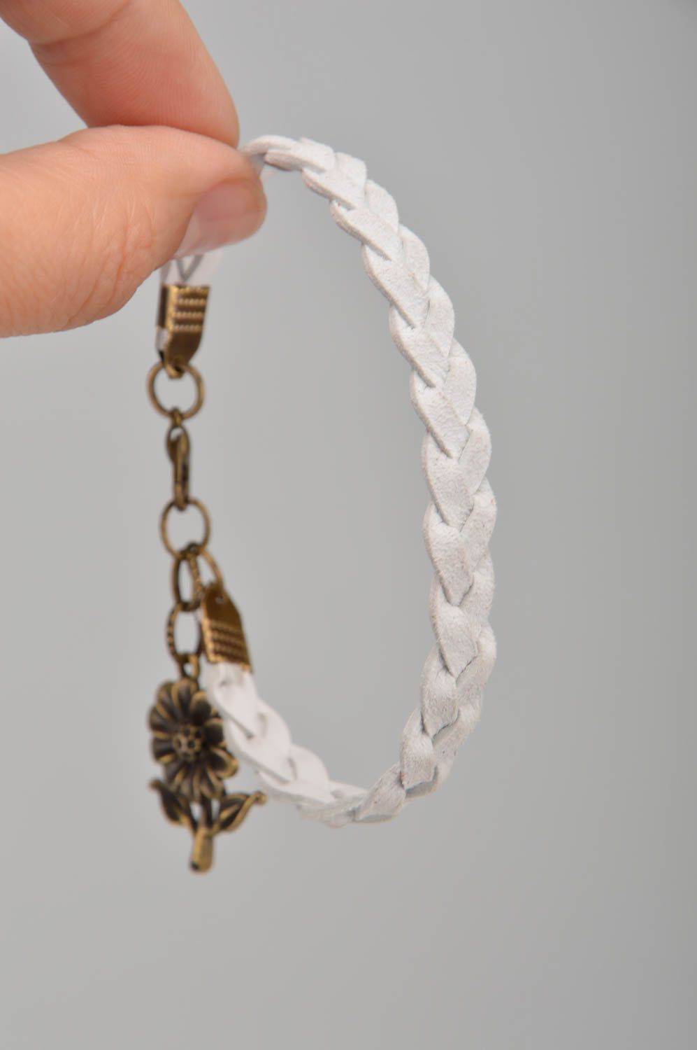 Handmade white genuine leather woven wrist bracelet of laconic design for women photo 4