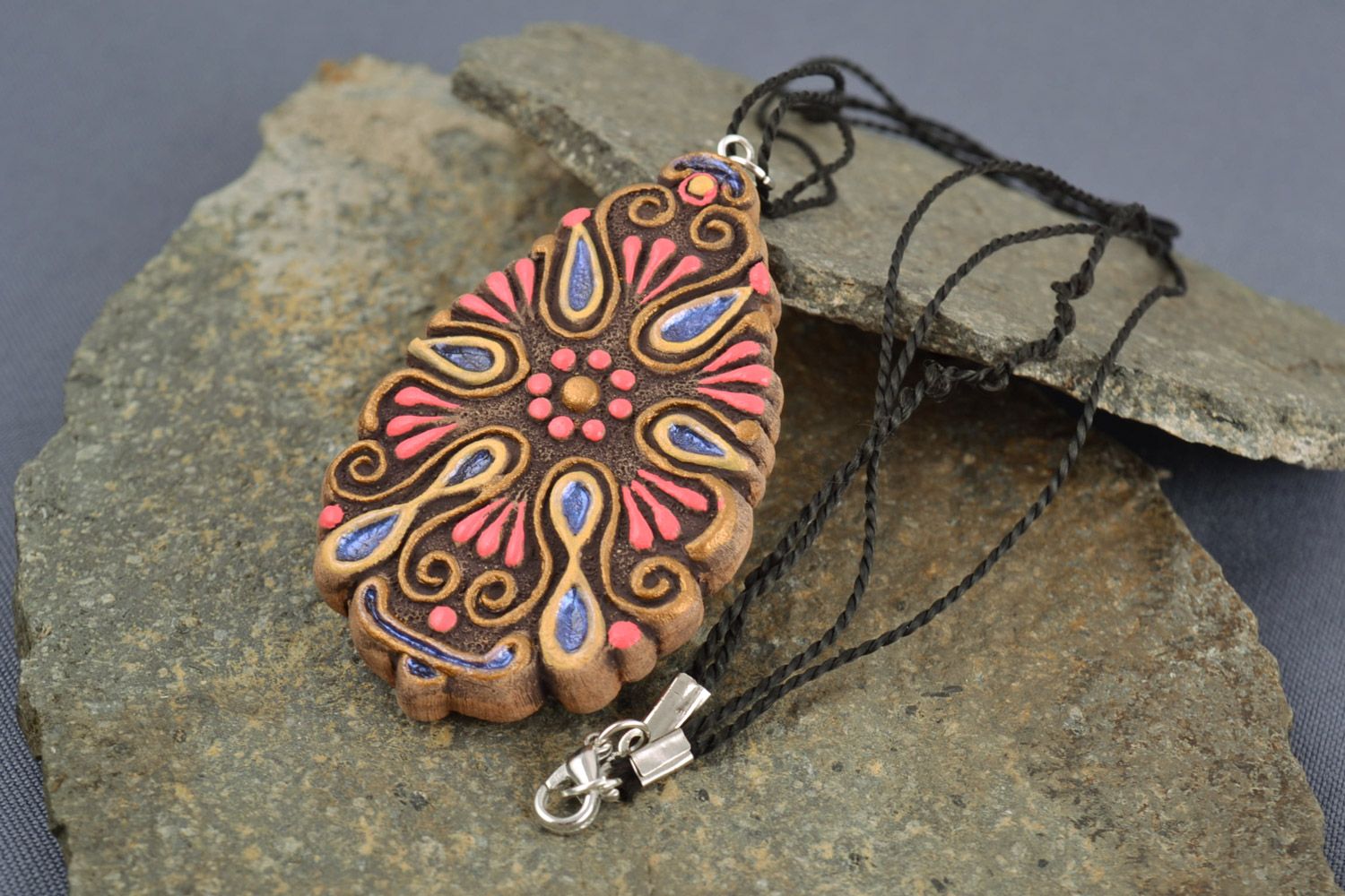 Homemade drop-shaped ceramic pendant with relief ornament and acrylic painting photo 1