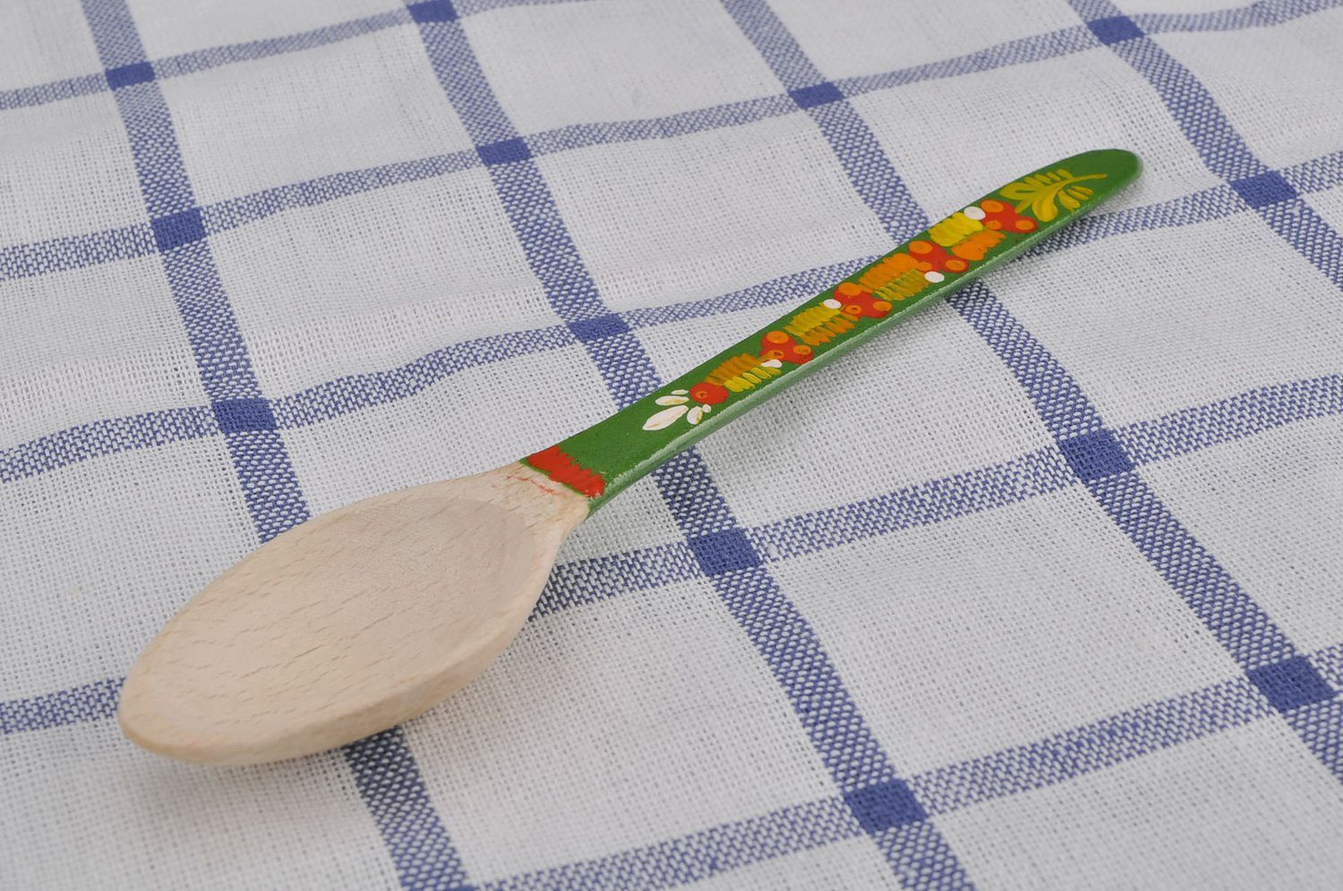 Wooden teaspoon with green handle photo 1