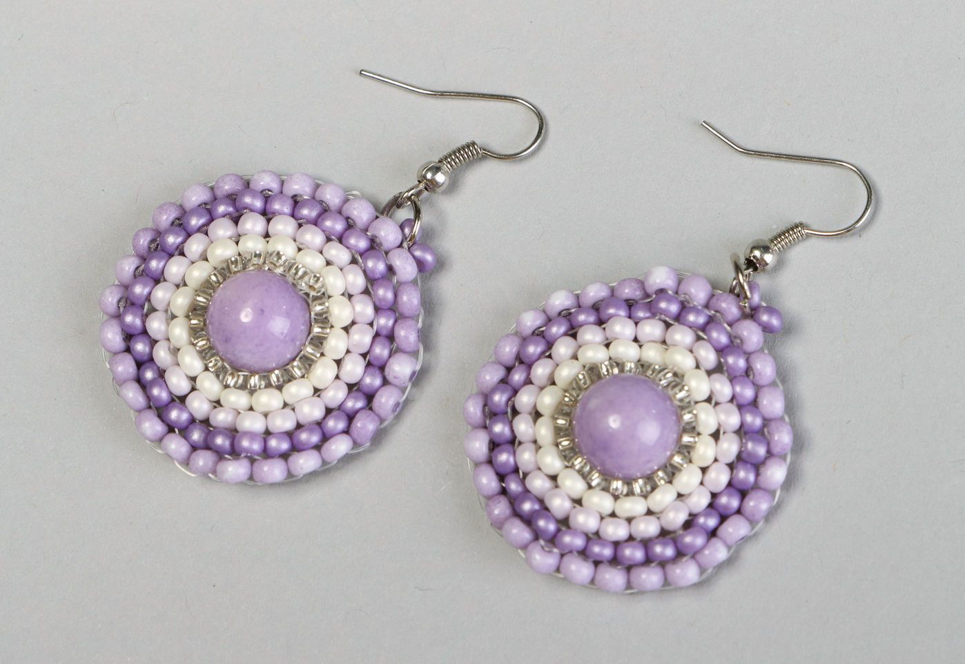 Round earrings with charoity photo 3
