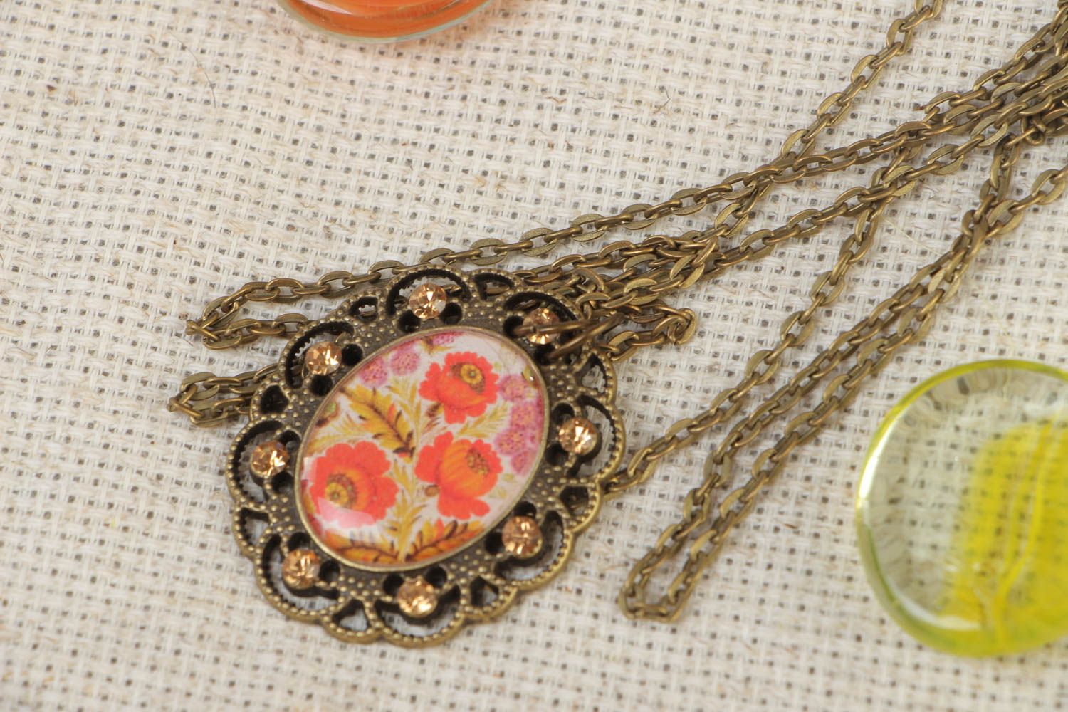 Handmade vintage metal pendant with floral image and glass glaze on chain 700 mm photo 1