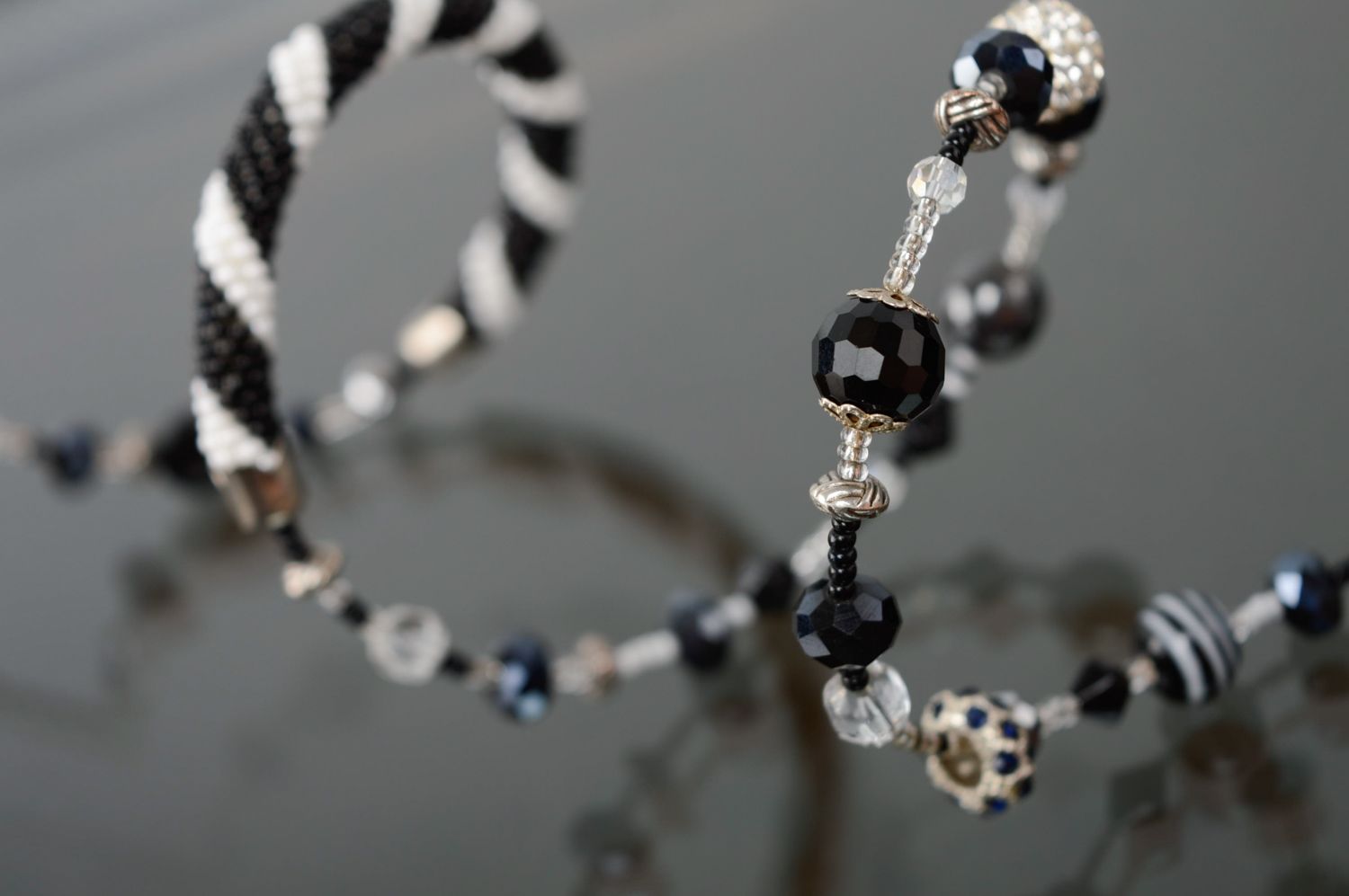 Black and white handmade beaded cord bracelet photo 3