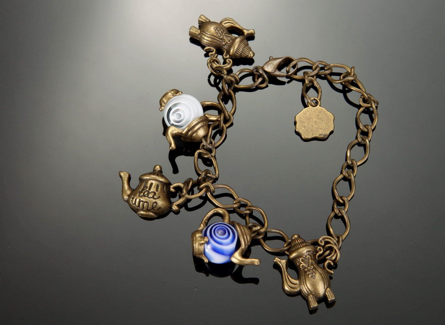 Bracelet with pendants made of bronze photo 2