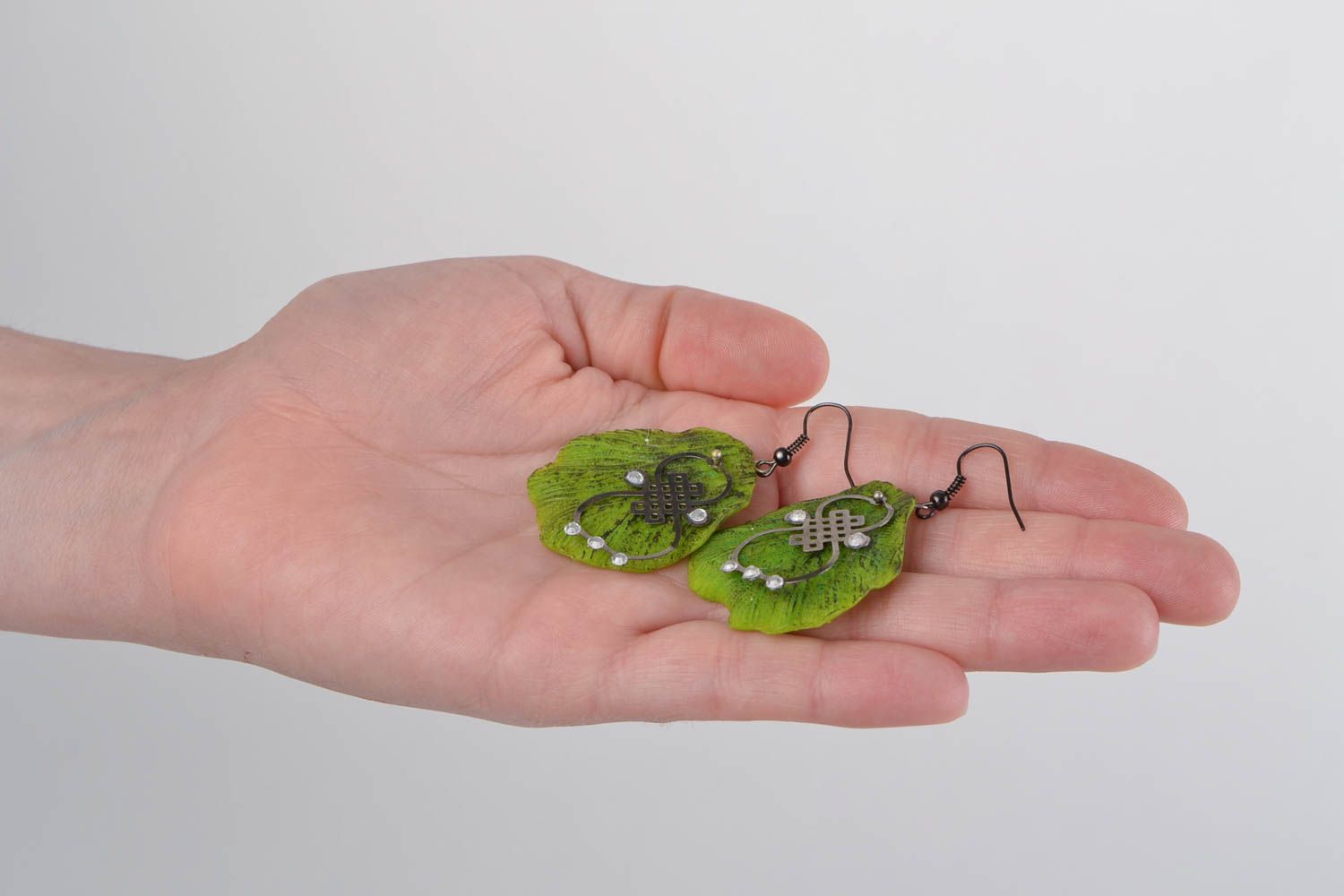 Handmade green plastic dangle earrings in the shape of leaves photo 2