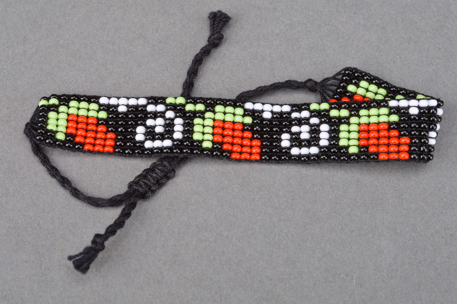 Unusual handmade woven bead bracelet black with red flowers photo 5