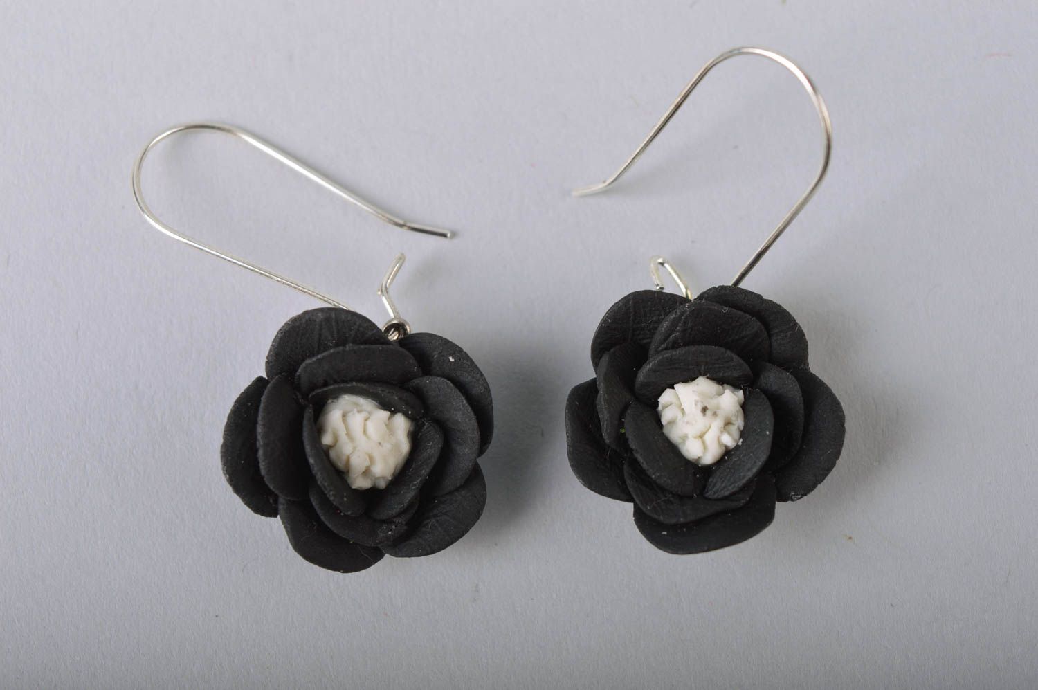 Handmade elegant designer dangle earrings with black cold porcelain flowers photo 2