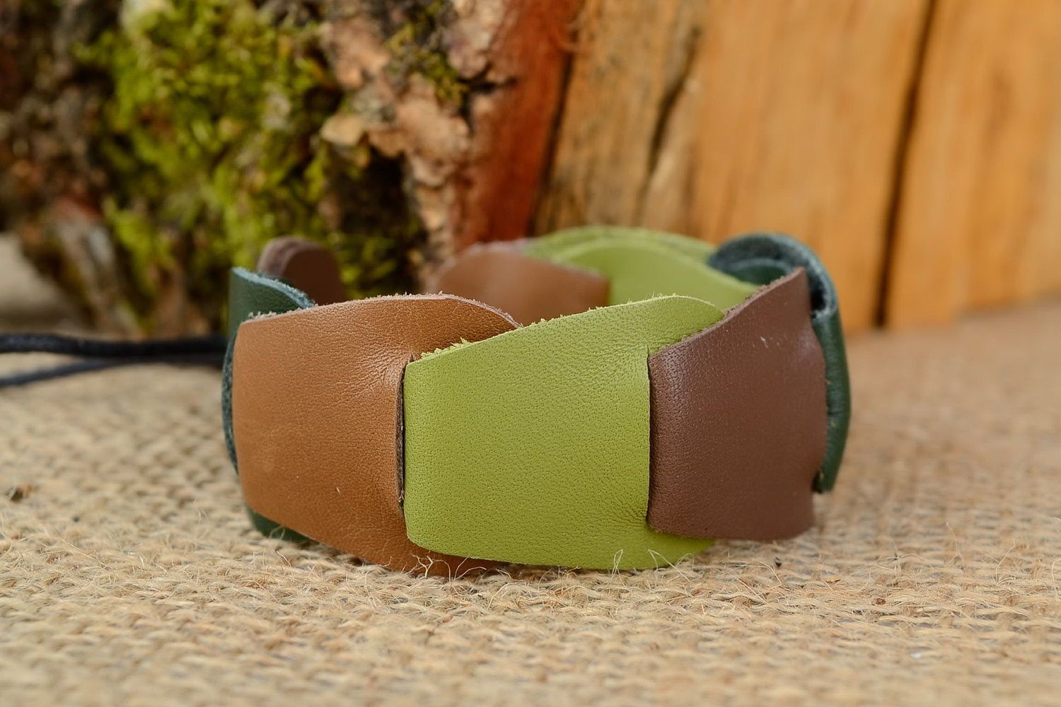 Leather bracelet of brown and green color photo 1