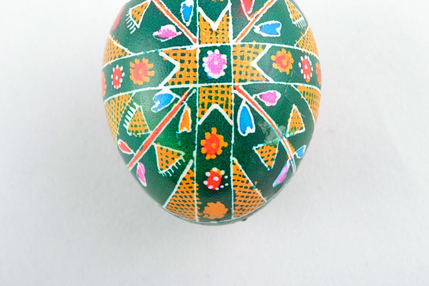Homemade green Easter egg painted with hot wax photo 5