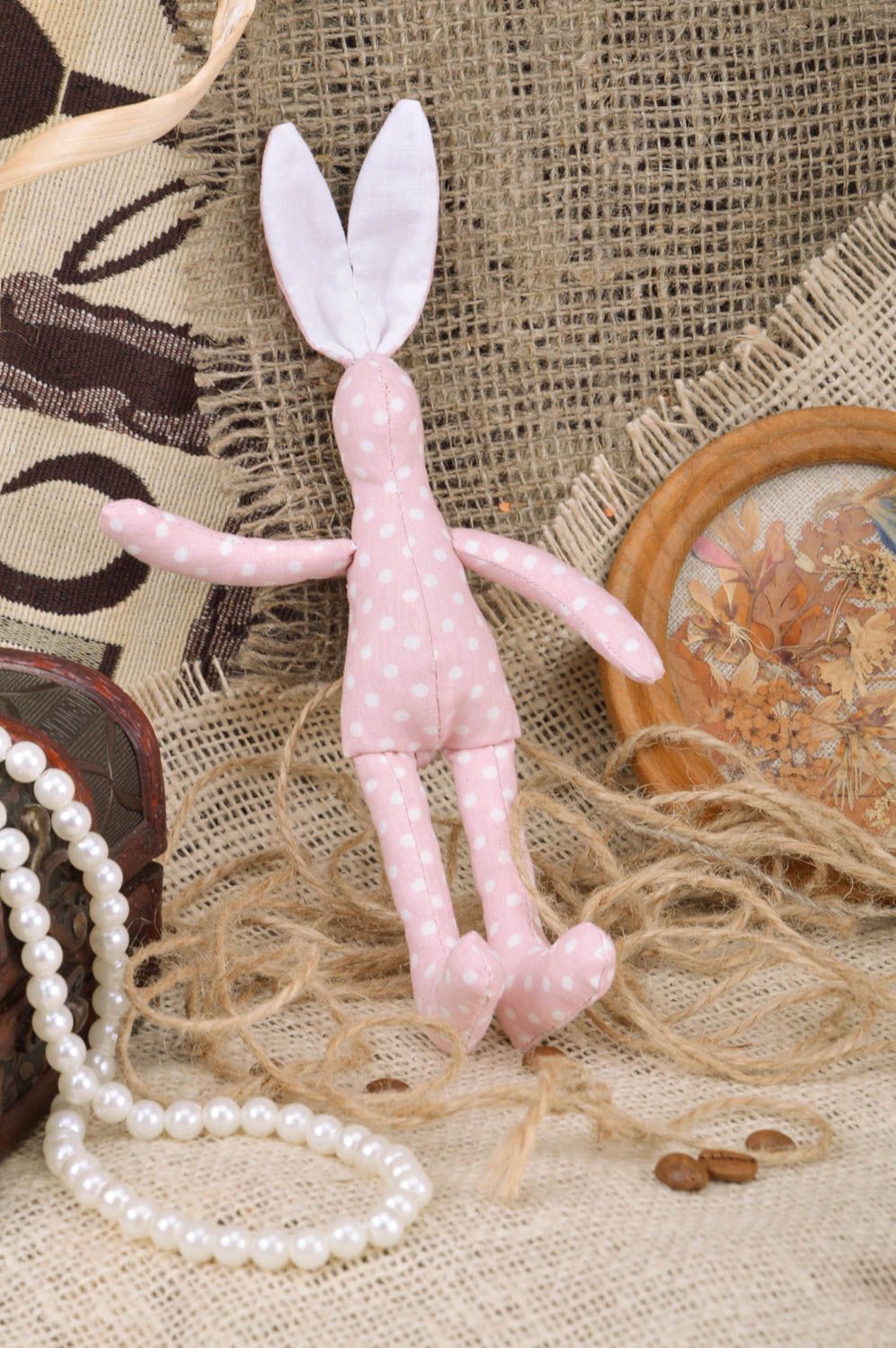 Beautiful handmade fabric soft toy hare of pink color with polka dot pattern photo 1