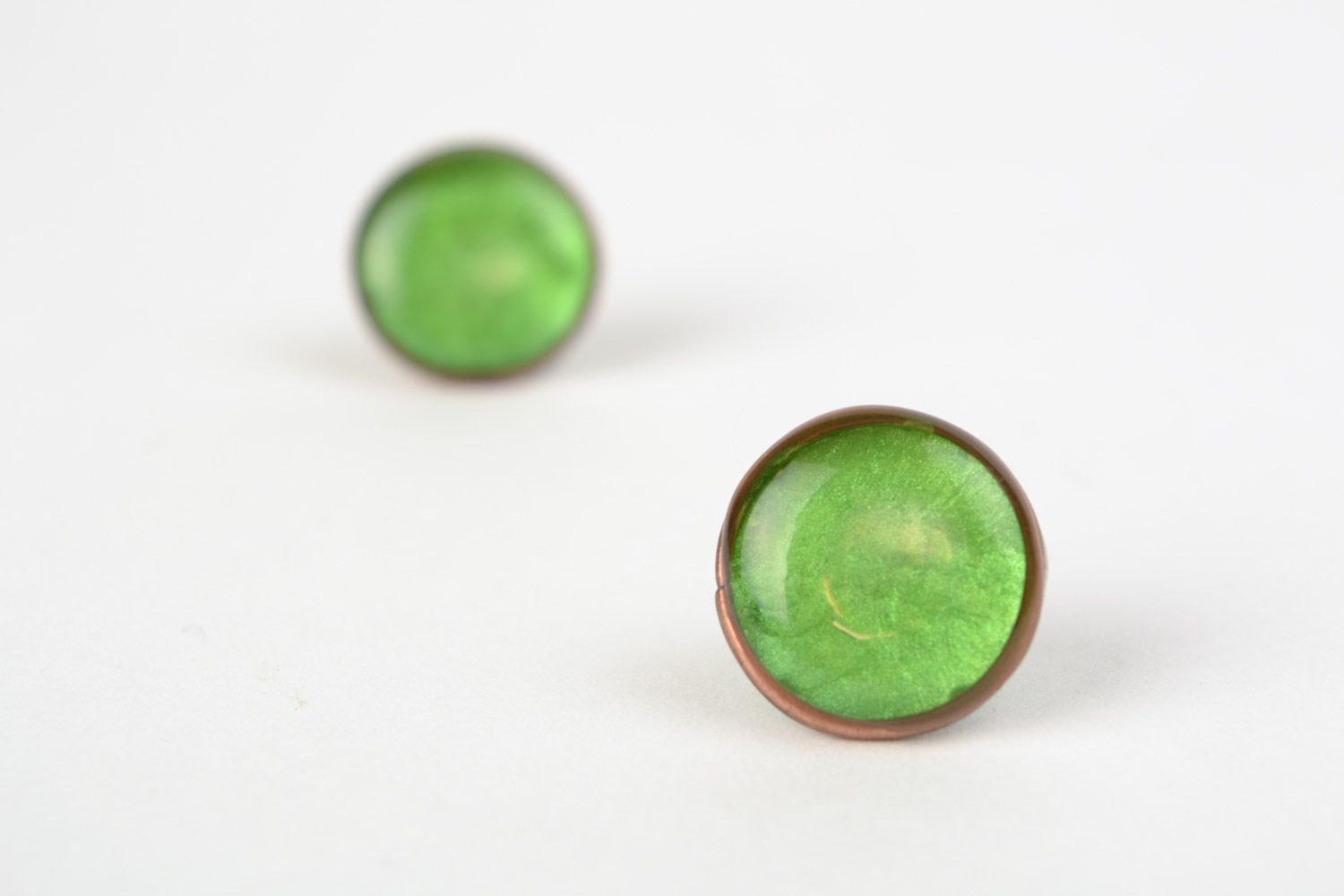 Handmade small epoxy resin stud earrings of round shape and green color photo 5