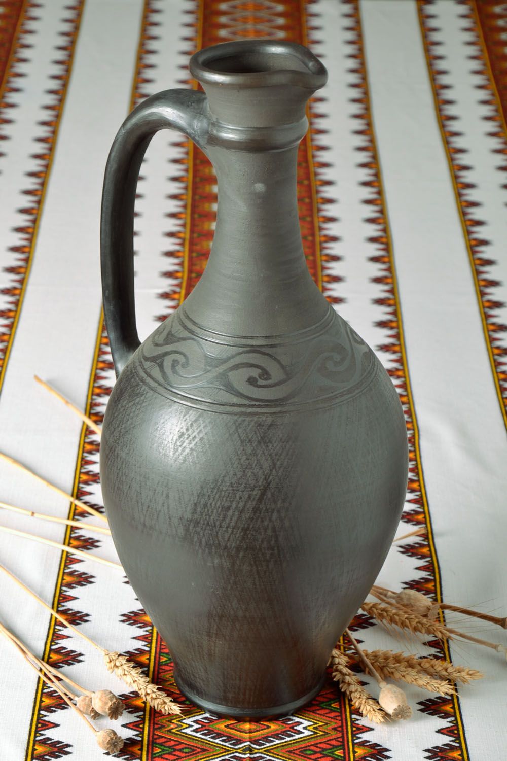 Jarrón decorativo de cerámica negra ahumada foto 1