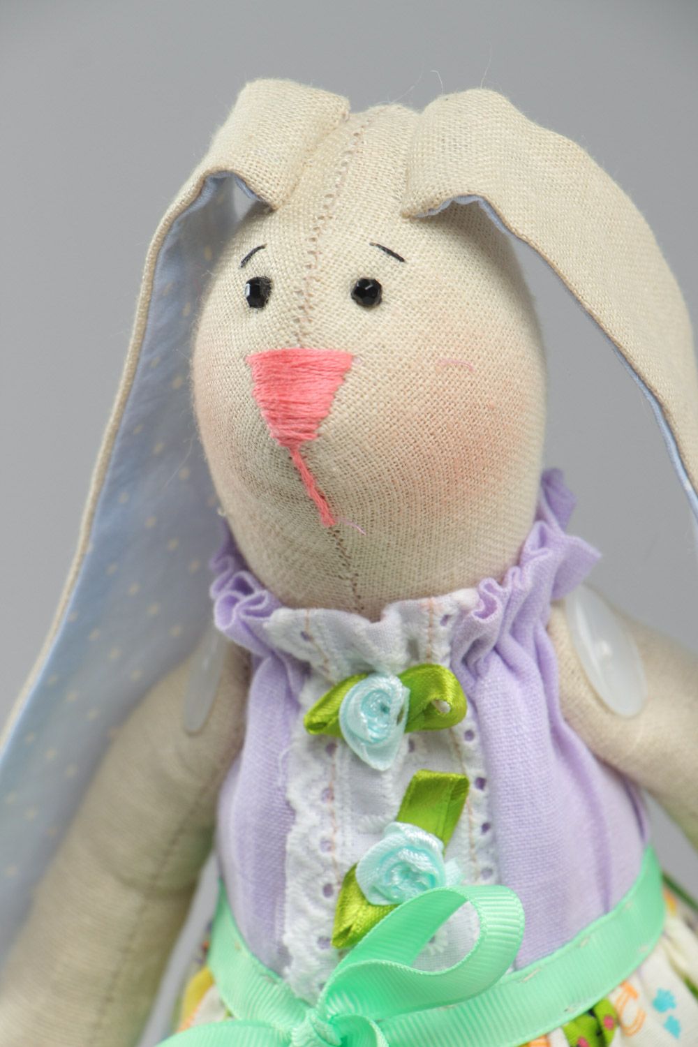 Handmade beautiful soft toy rabbit with long ears sewn of cotton fabric photo 3