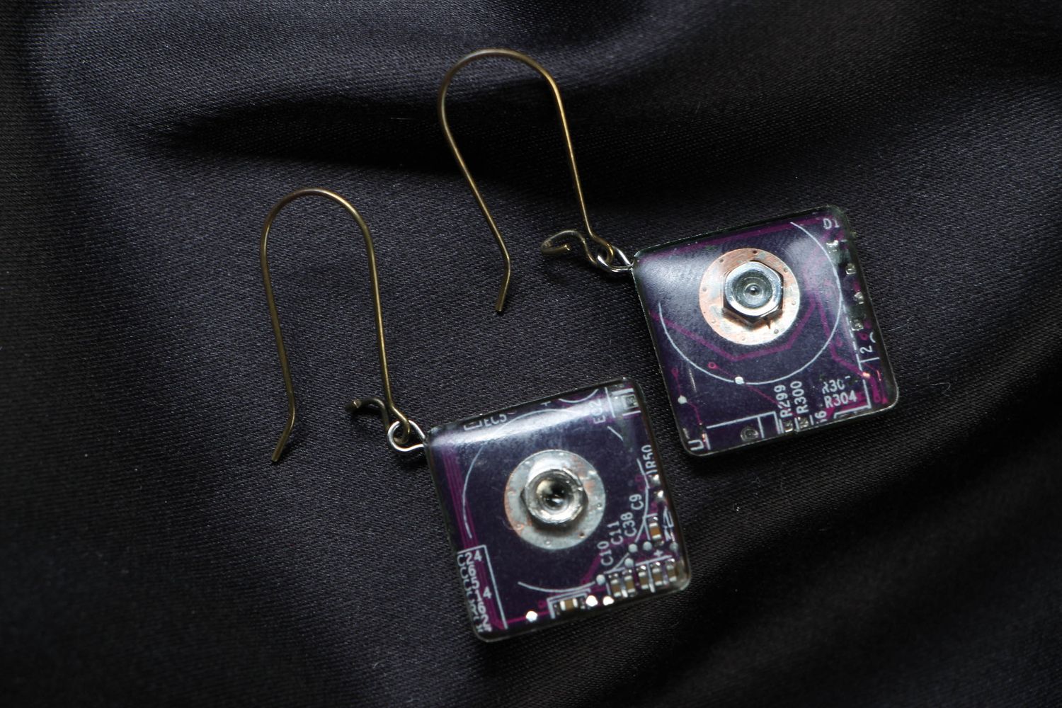 Beautiful metal earrings with microchips photo 1