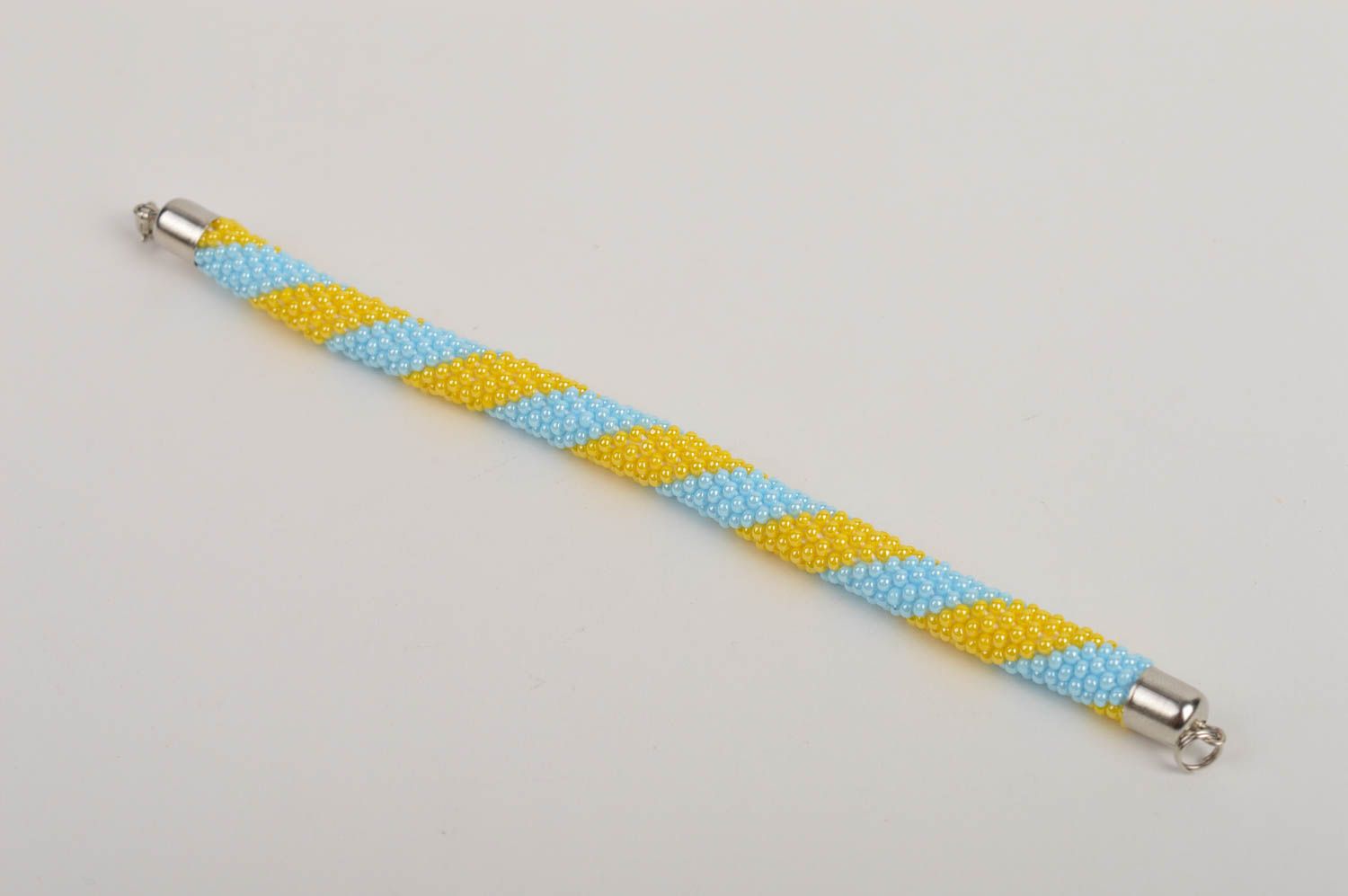 Homemade cord made of Czech beads adjustable bracelet in yellow and blue color photo 2
