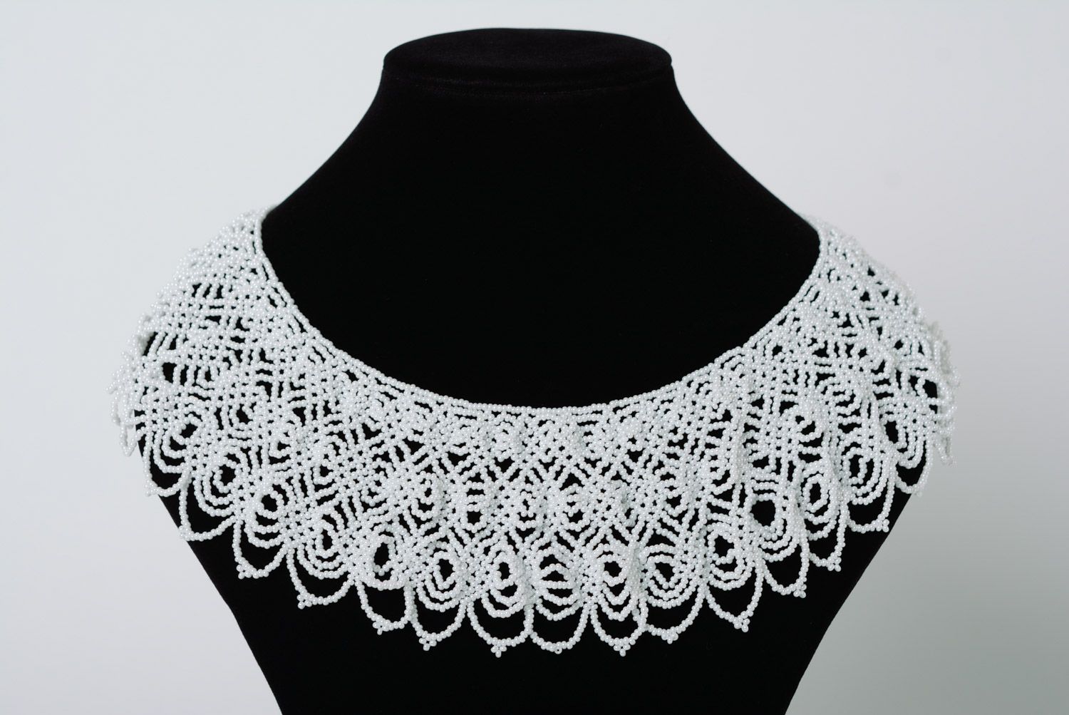 Beautiful handmade broad lacy necklace woven of white beads for ladies photo 1