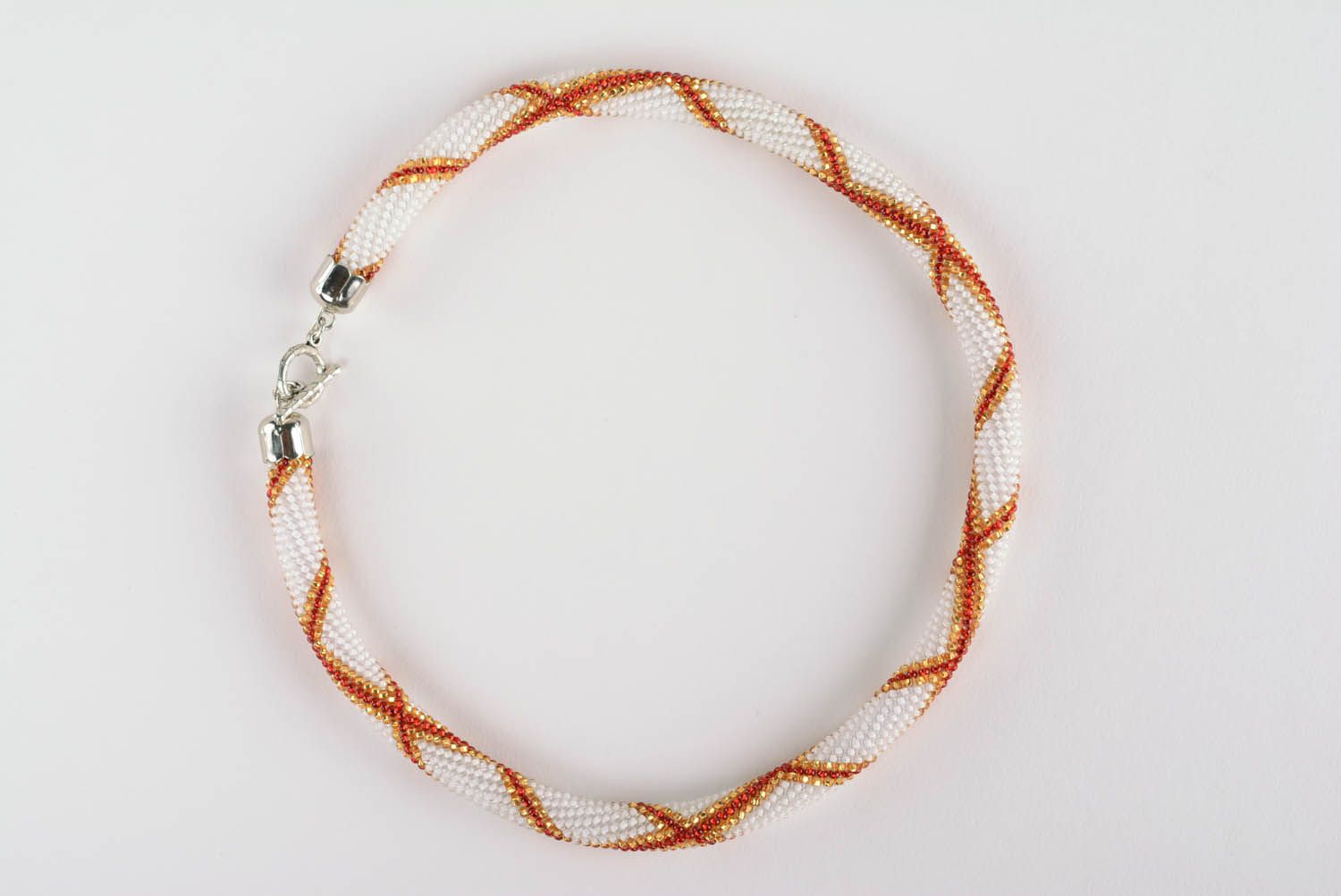 Handmade beaded cord necklace in white, red, and orange beads photo 4