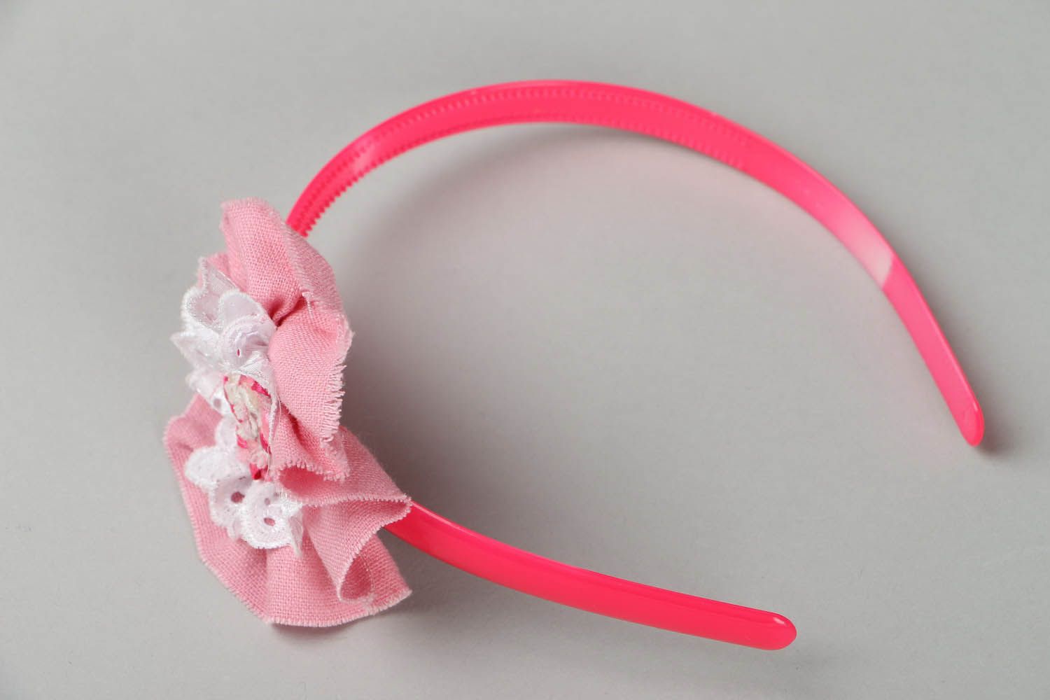 Pink hairband with flower photo 1