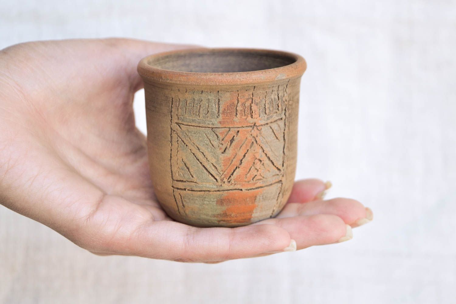 Clay no handle drinking cup of medium size photo 2
