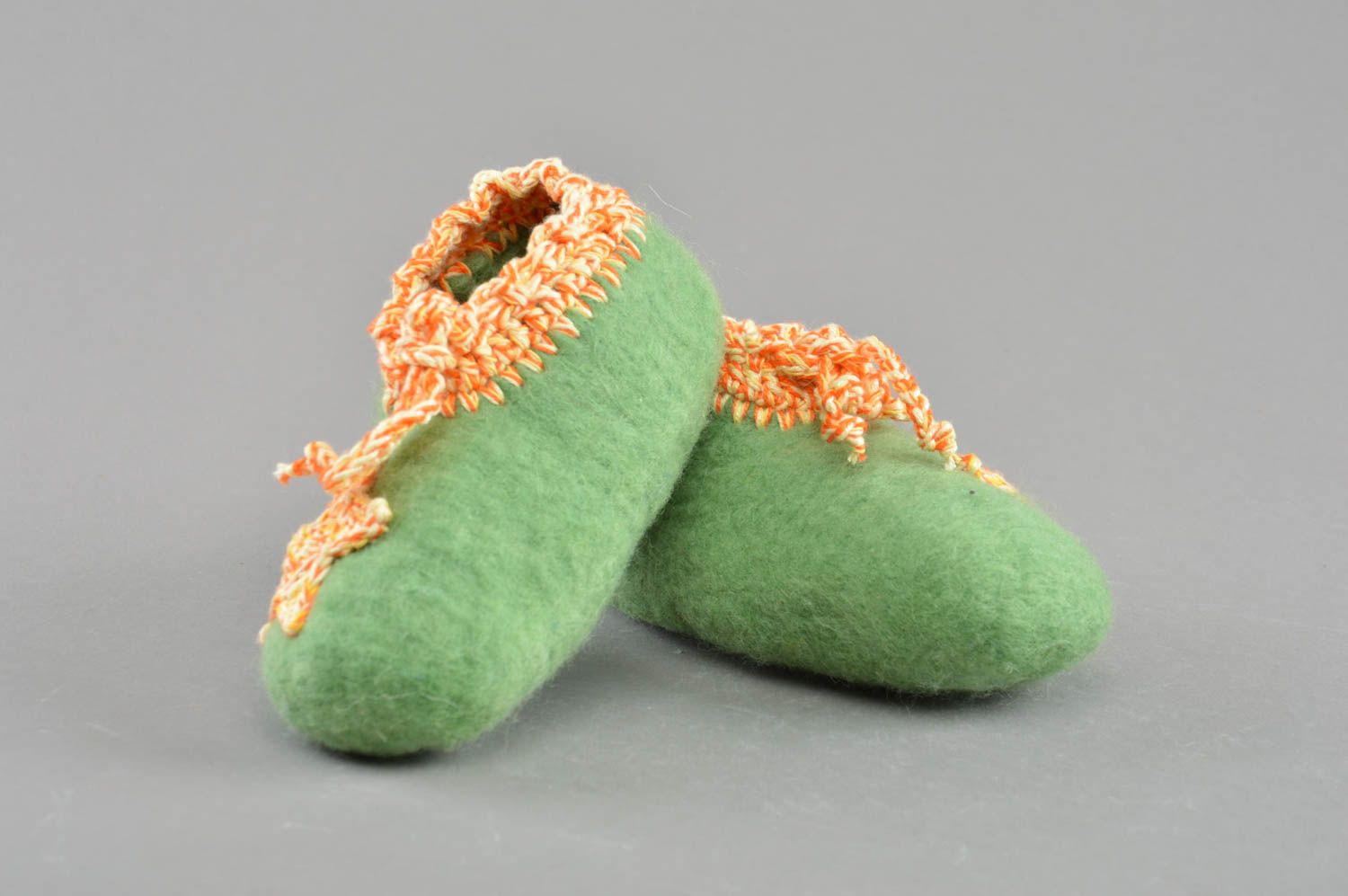 Handmade designer felted wool light green baby booties with crocheted edges photo 1