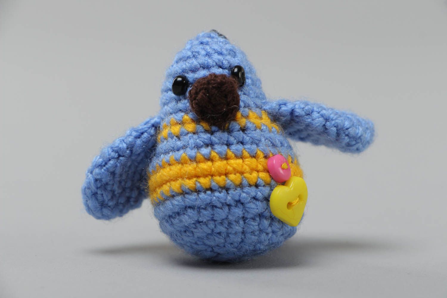 Handmade small soft toy keychain crocheted of acrylic threads blue yellow bird photo 3