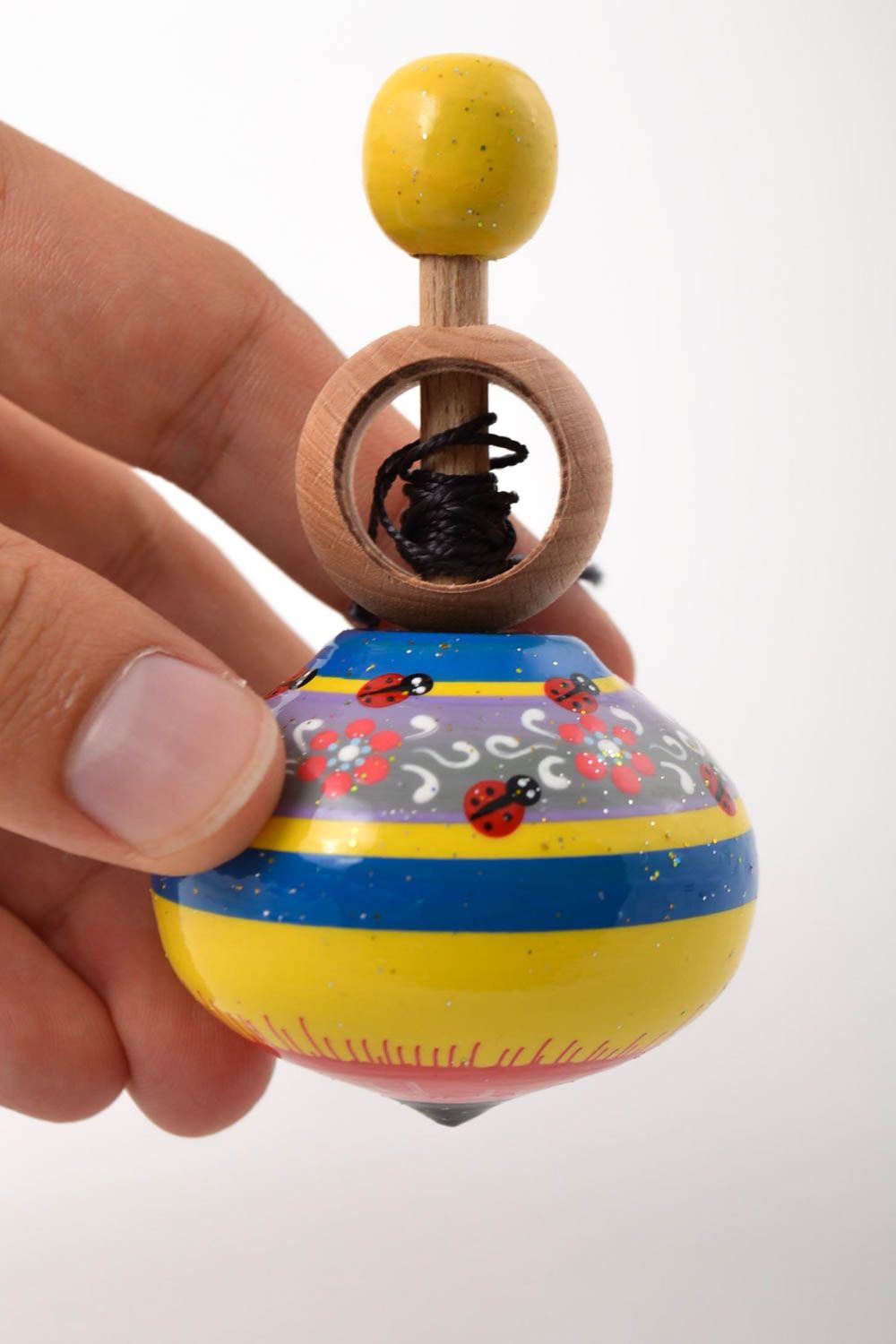 Peonza de madera hecha a mano regalo original juguete para niños con ornamentos foto 5