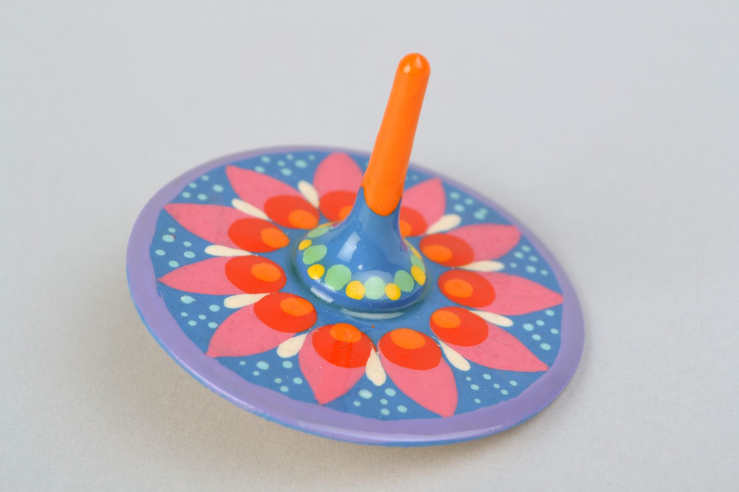 Handmade wooden spinning top toy with traditional Petrikivka painting for kids photo 3