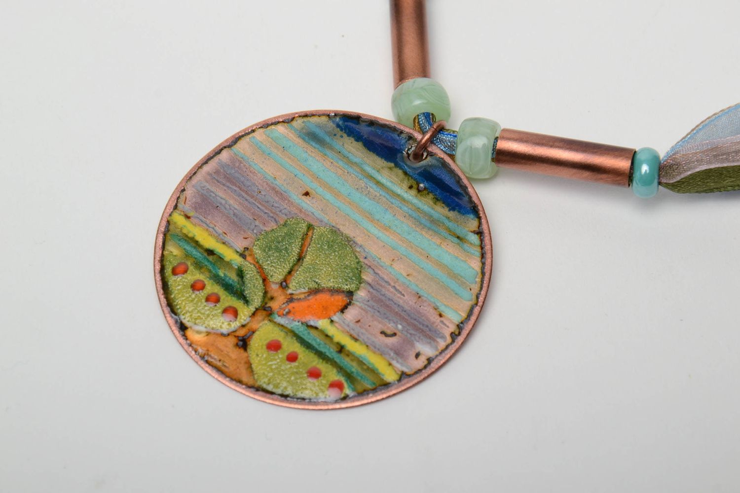 Round copper pendant with ornament painted with enamels photo 4