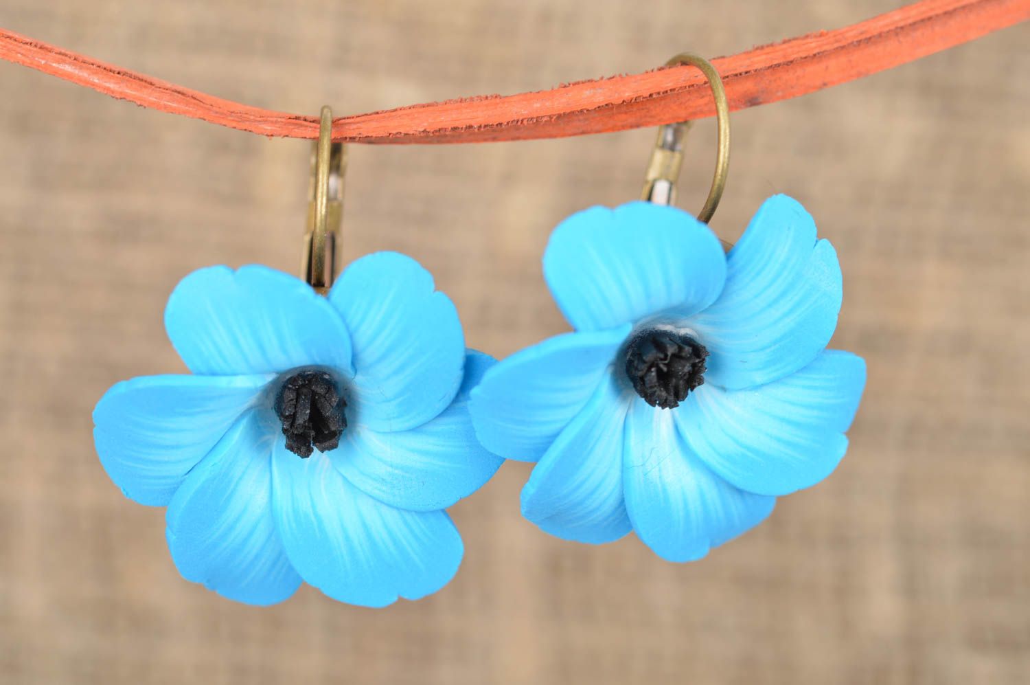 Handmade designer polymer clay flower earrings of blue color beautiful jewelry photo 1