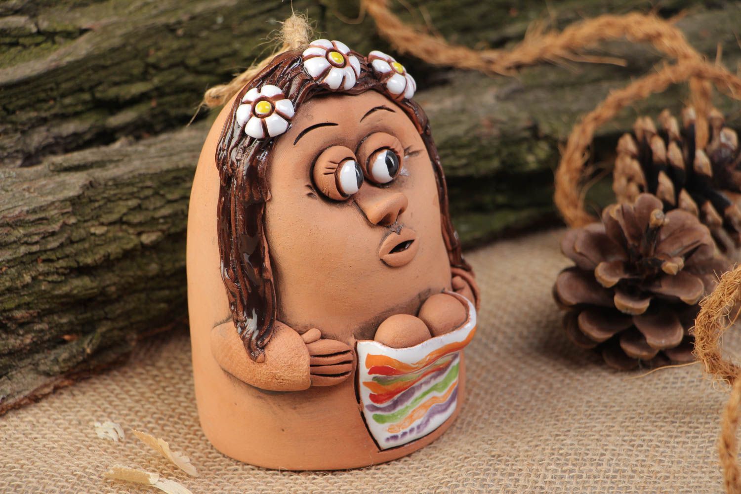 Handmade decorative painted ceramic hanging bell in the shape of a funny girl photo 1