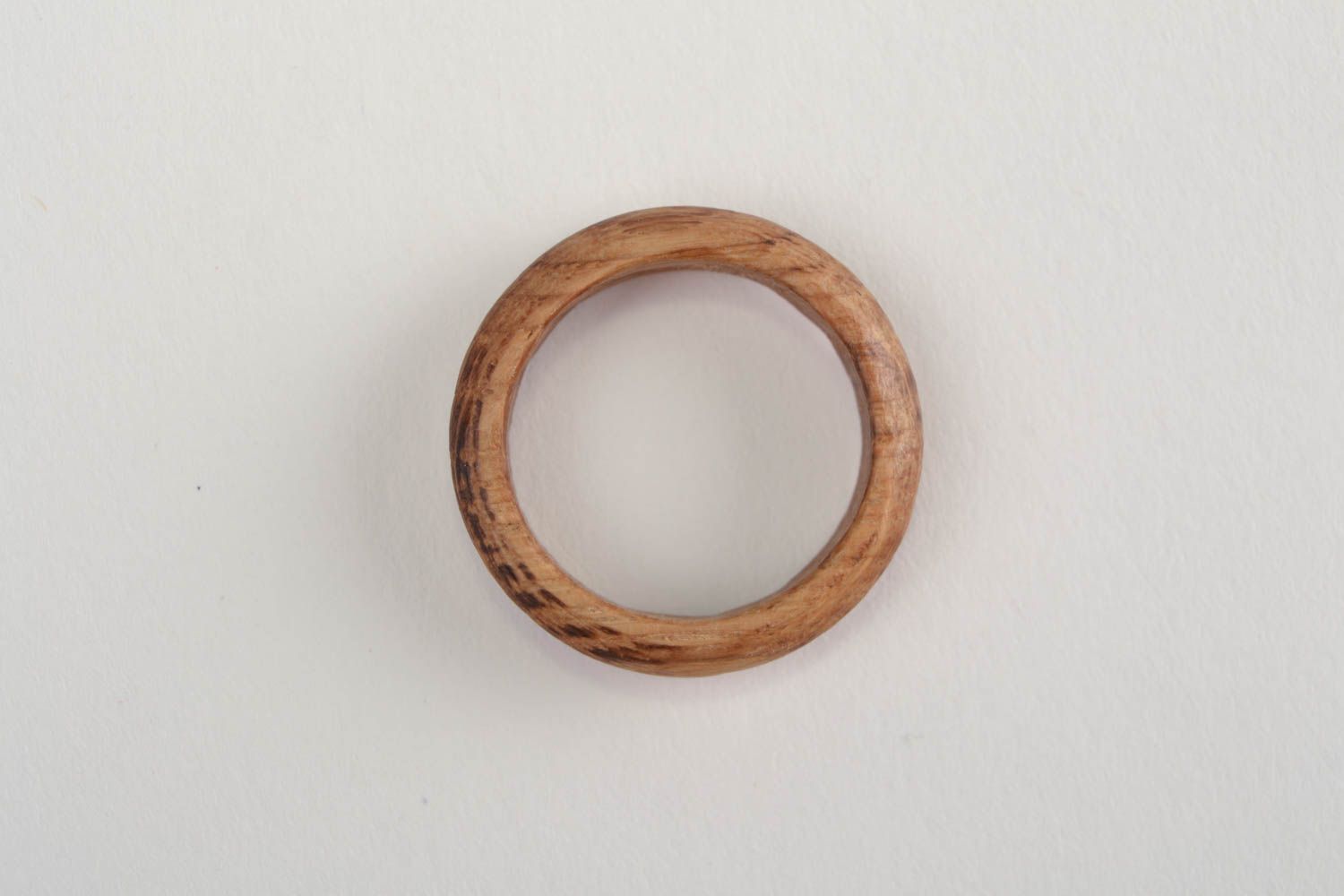 Simple handmade jewelry ring carved of natural oak wood of laconic design photo 4