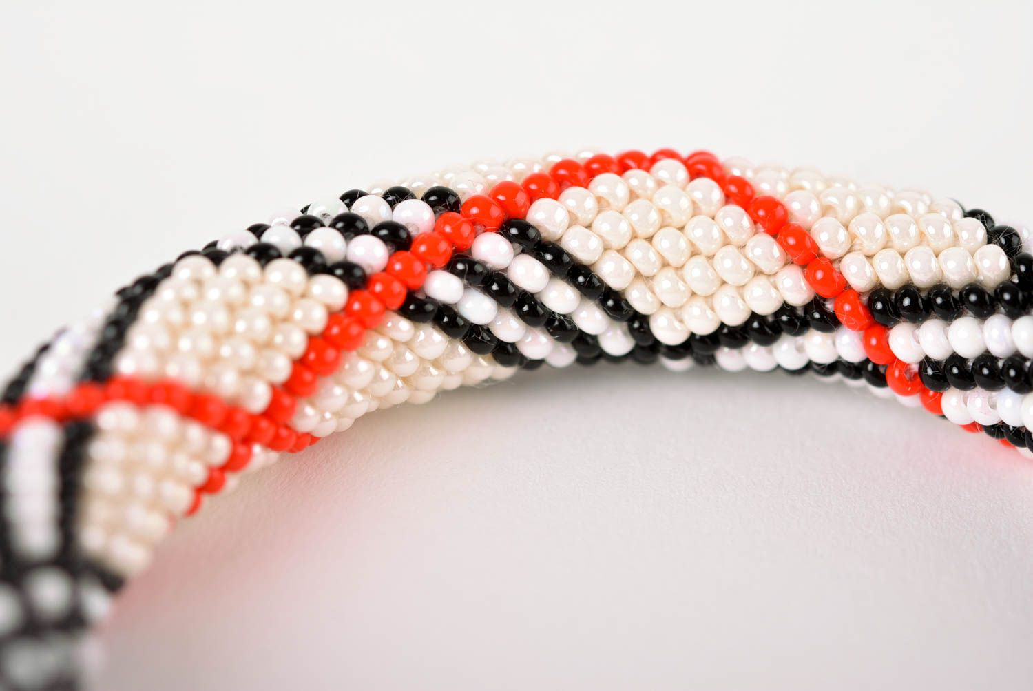 Handmade modern beaded cord all-size bracelet in white, black, red colors for women photo 3