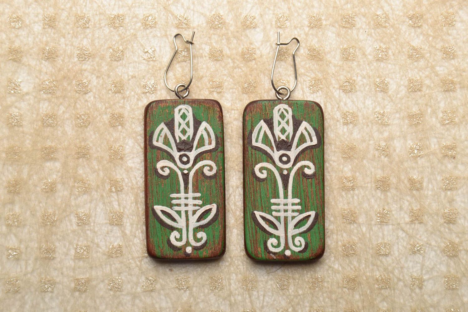 Wooden earrings with painting photo 1