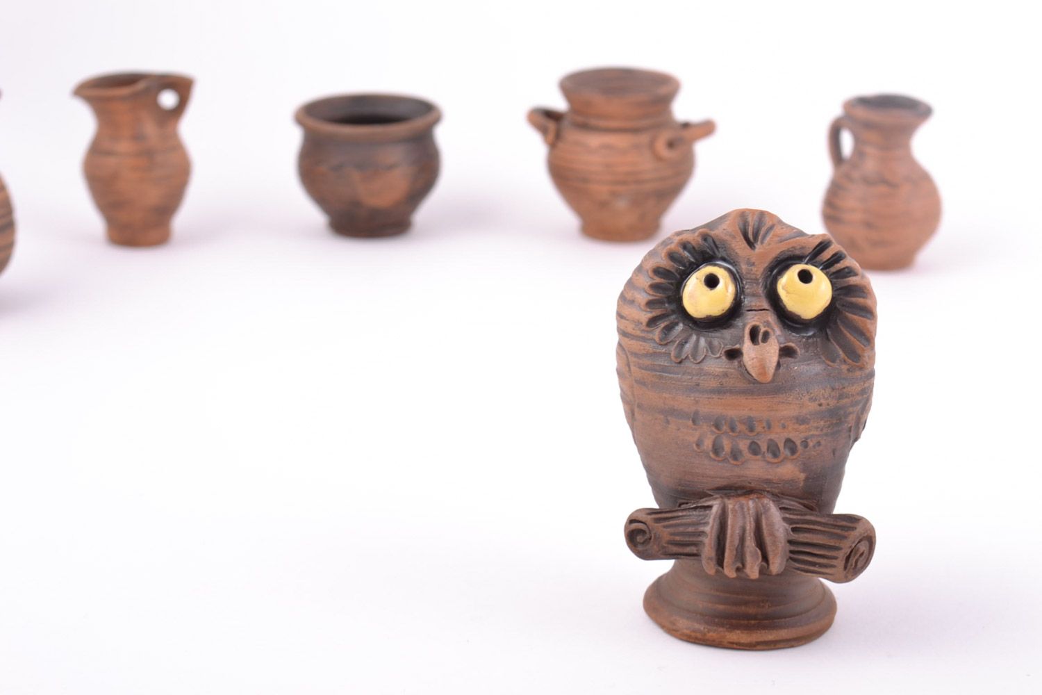 Miniature handmade ceramic figurine of owl kilned with milk photo 1