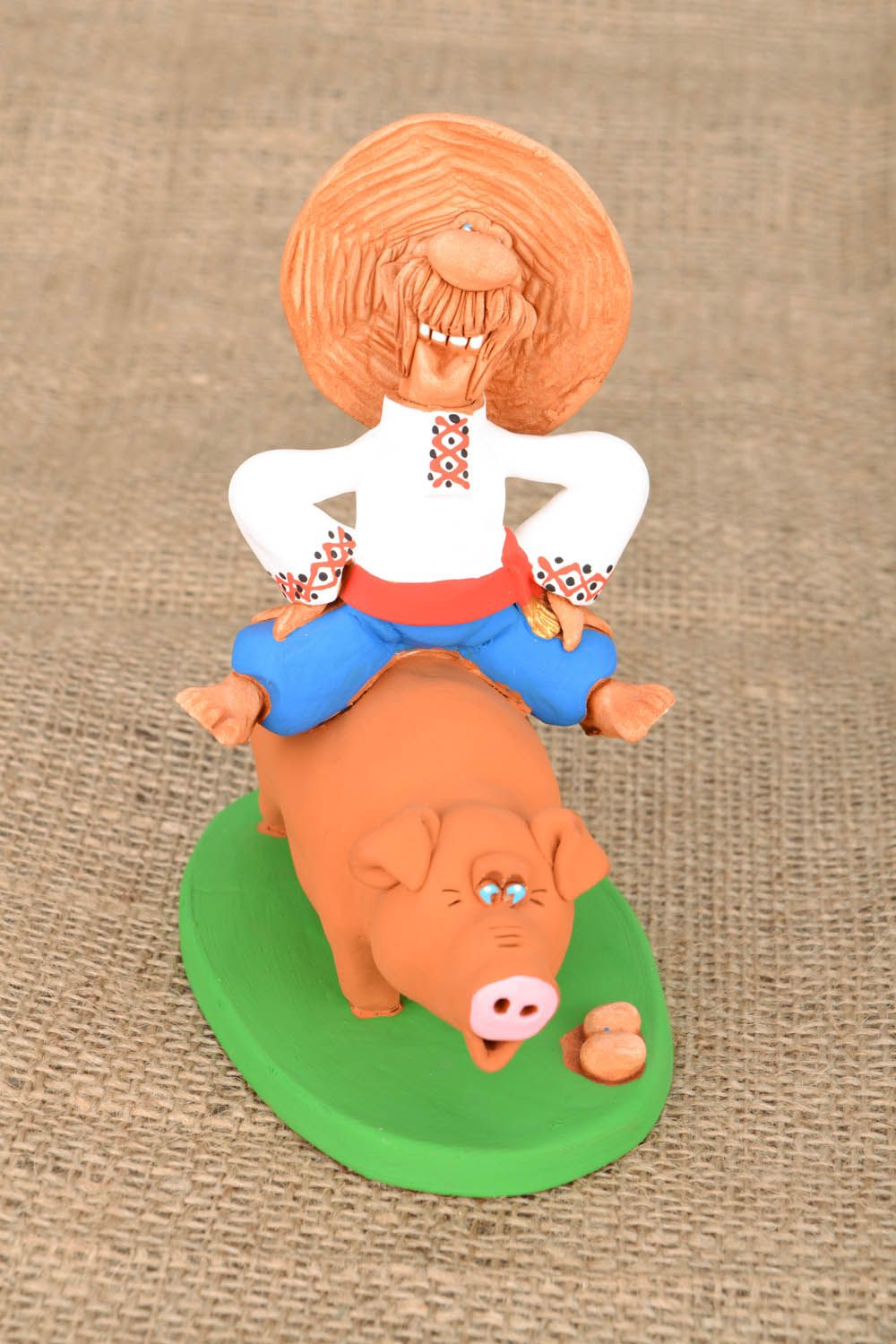Homemade clay statuette Cossack Riding a Pig photo 1