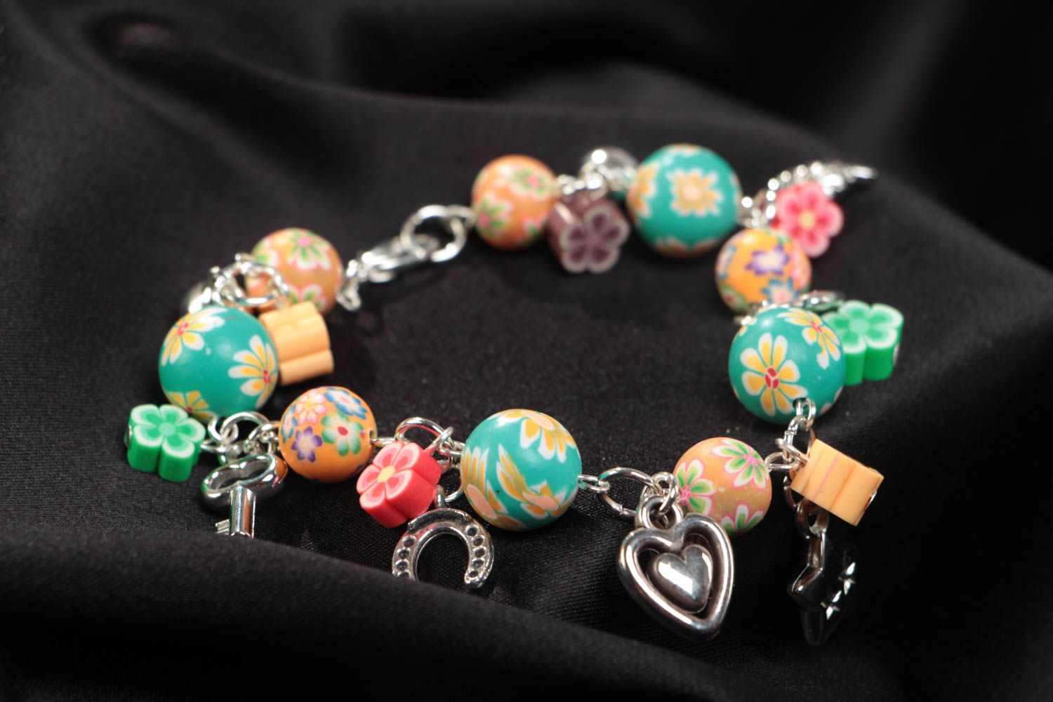Beautiful children's designer handmade polymer clay bracelet with charms photo 1