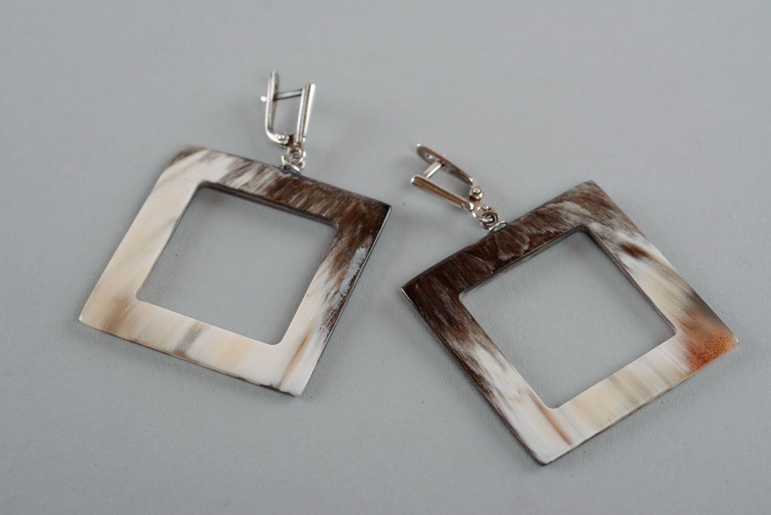 Silver earrings with horn photo 4