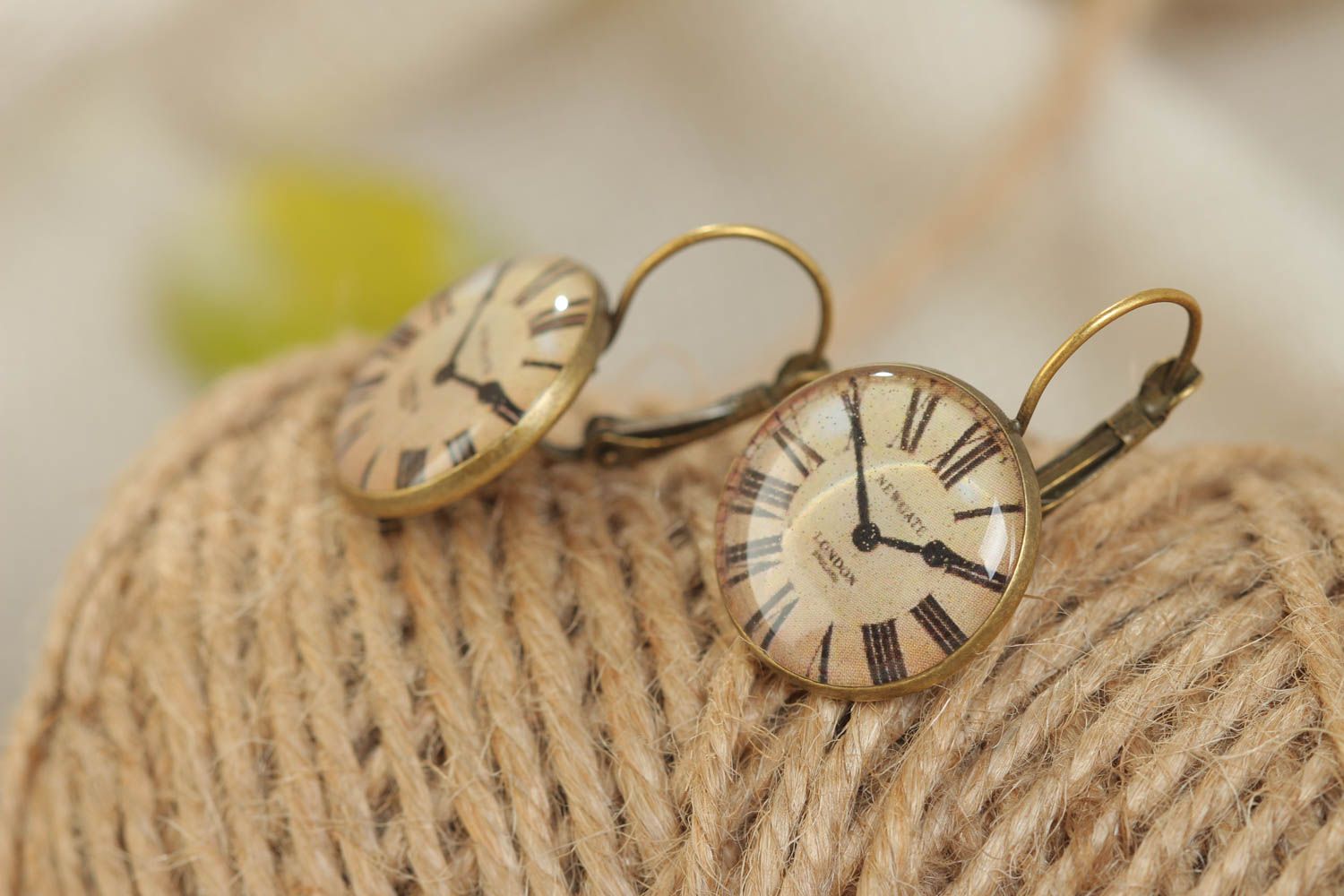 Handmade round earrings with metal basis and image of clocks in glass glaze photo 1