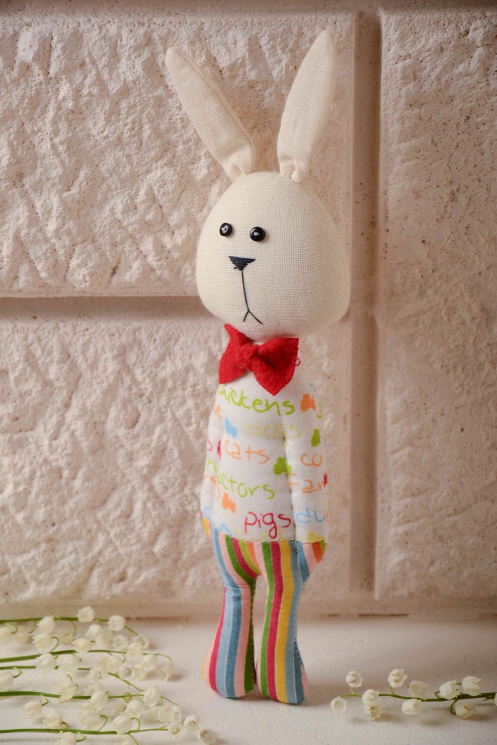 Handmade small cotton fabric soft toy rabbit in striped trousers with red bow tie photo 1