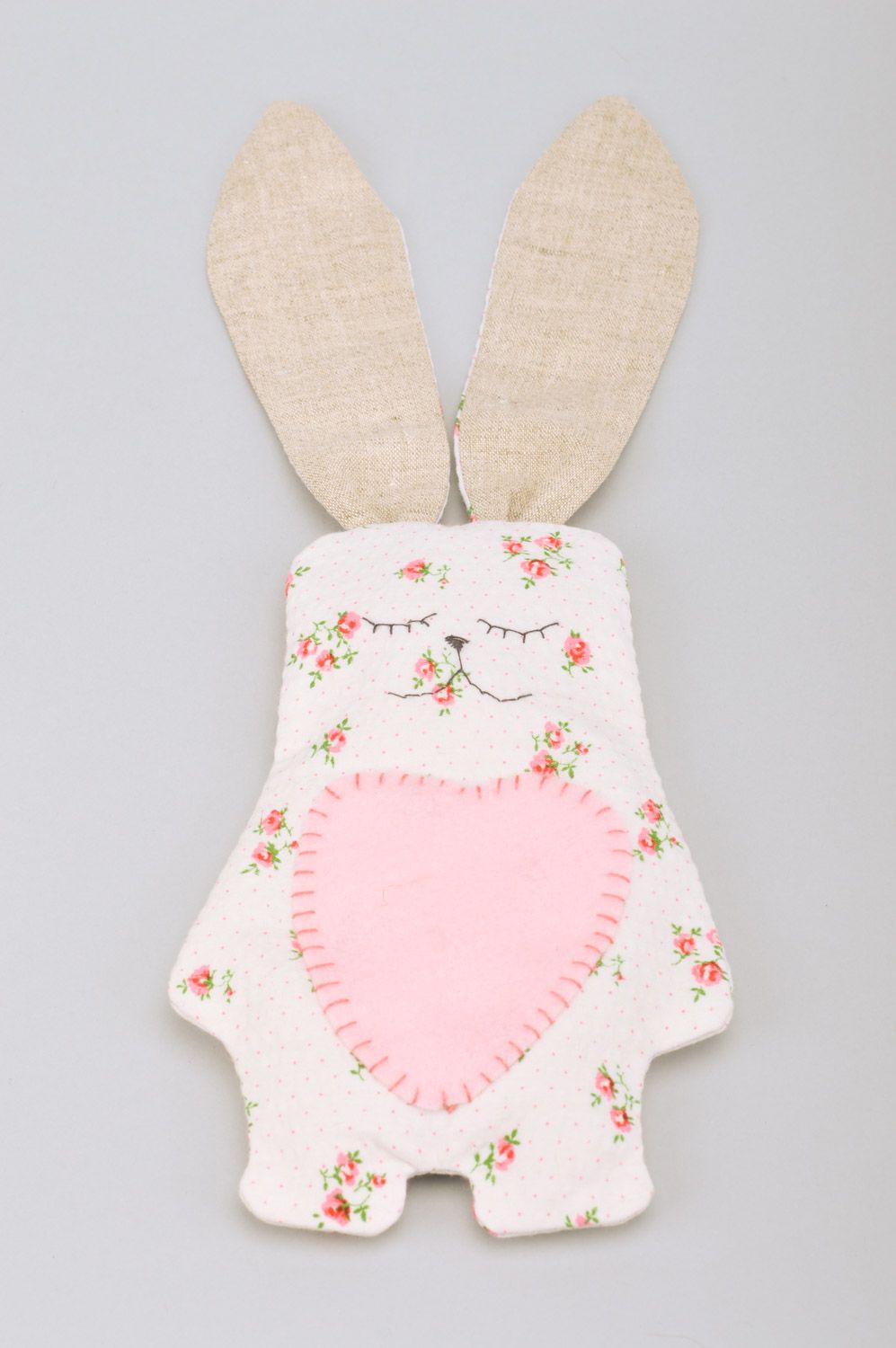 Handmade soft toy rabbit with long ears sewn of cotton fabric with floral print photo 2