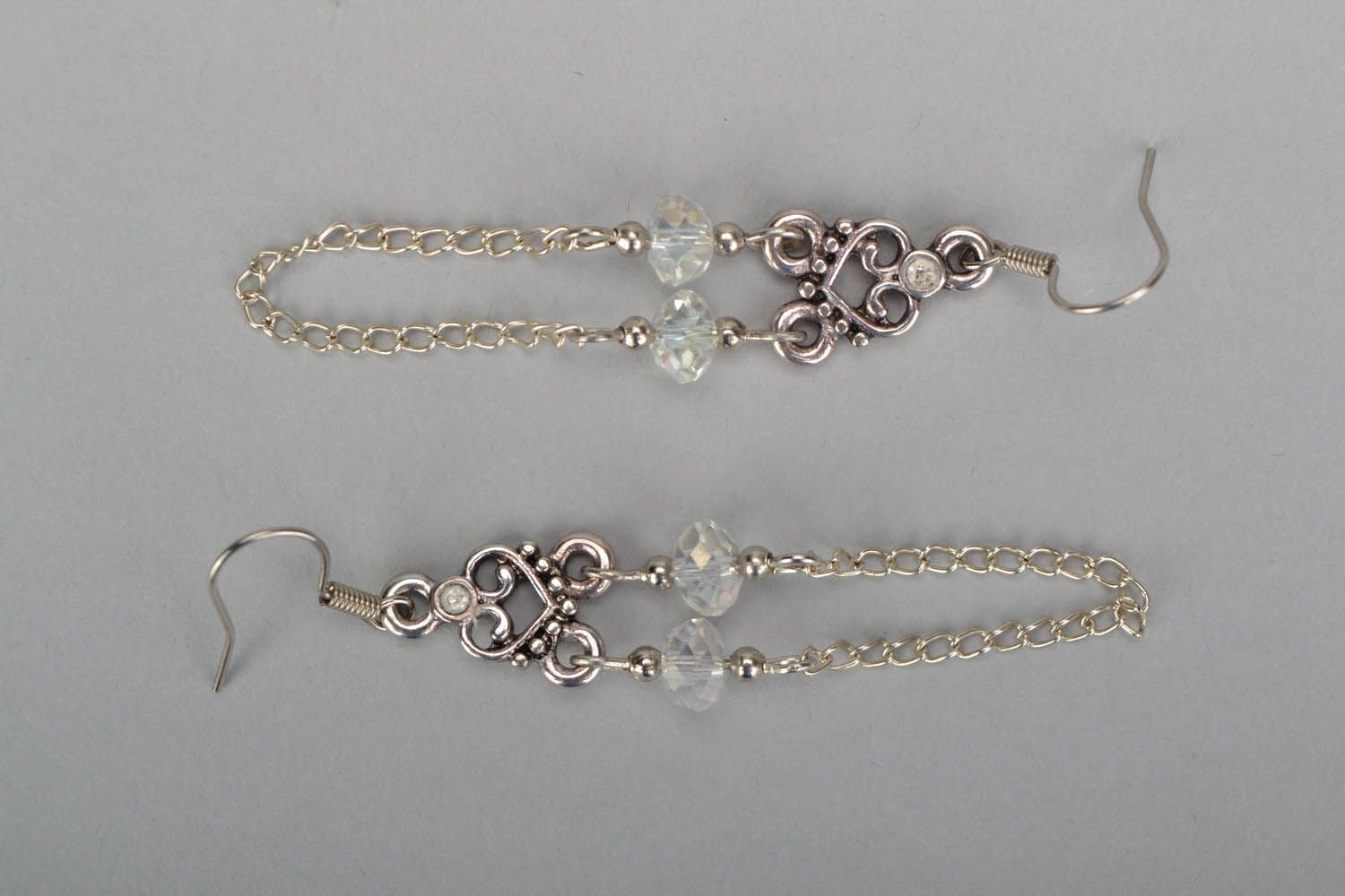 Metal earrings with crystal beads photo 3