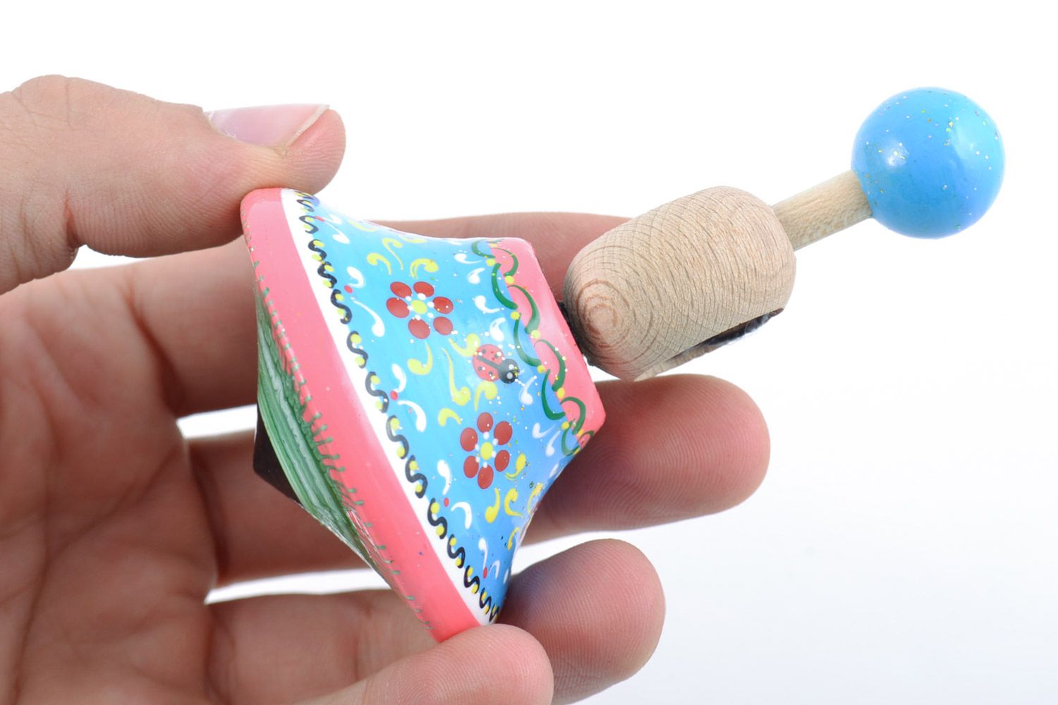 Trompo de madera pintado artesanal juguete de desarrollo para niños  foto 2