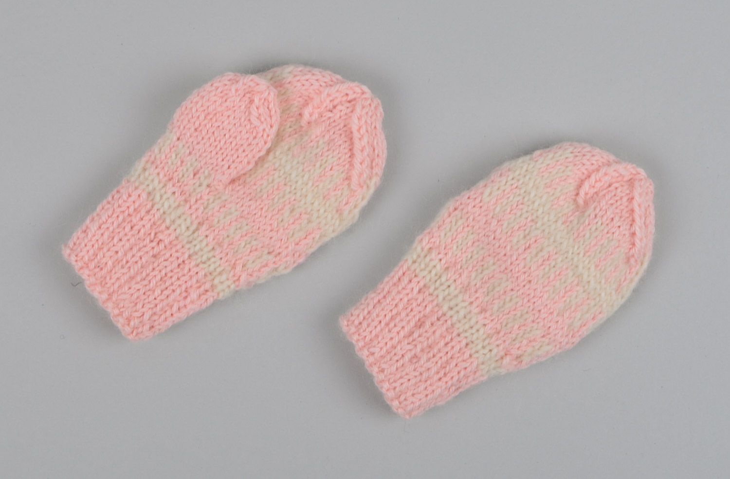 Small handmade warm winter mittens knitted of pink woolen threads for little girl photo 4