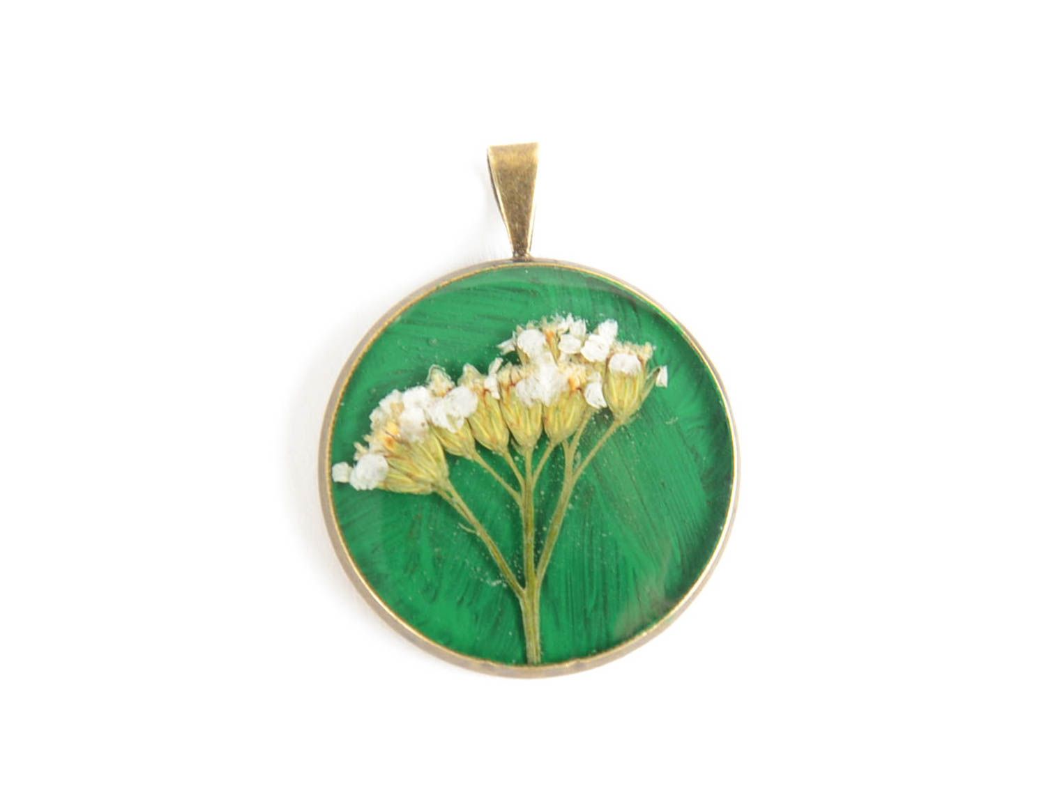 Handmade round epoxy resin pendant with white dry flowers inside photo 5