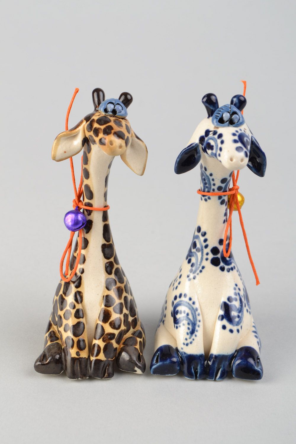 Set of 2 handmade designer ceramic figurines of giraffes painted with glaze photo 1